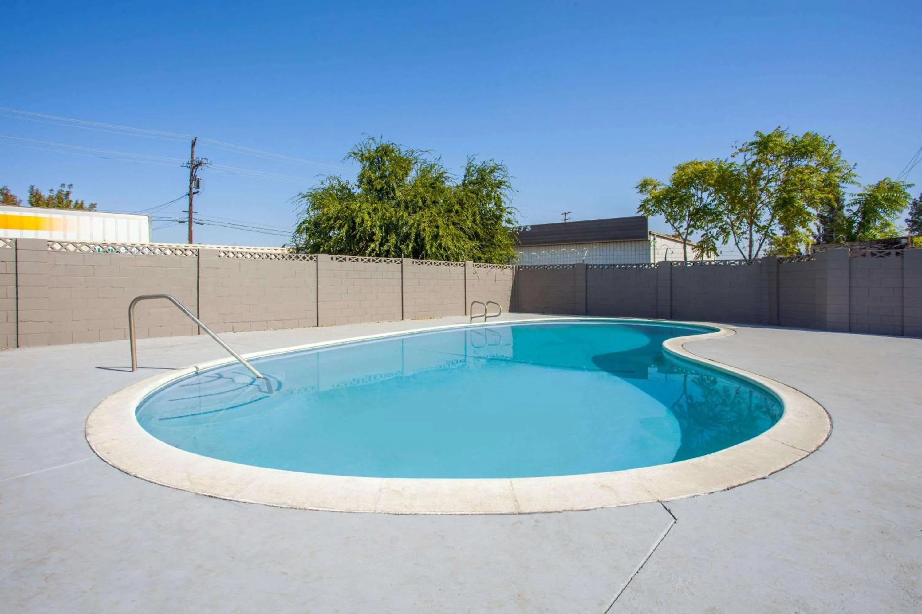 On site, Swimming Pool in Travelodge by Wyndham Fresno Yosemite Area