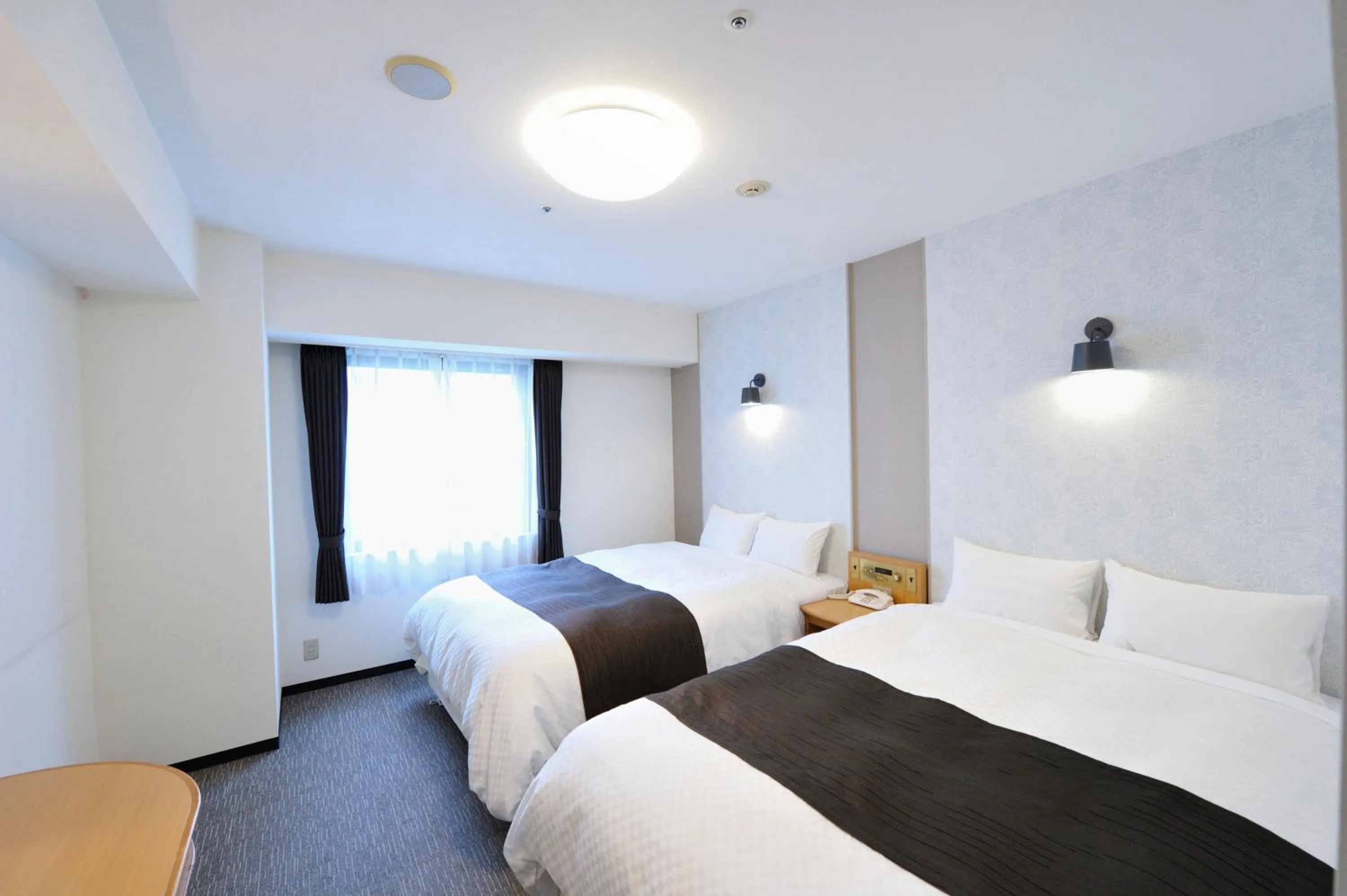 Bed in Court Hotel Shin-Yokohama