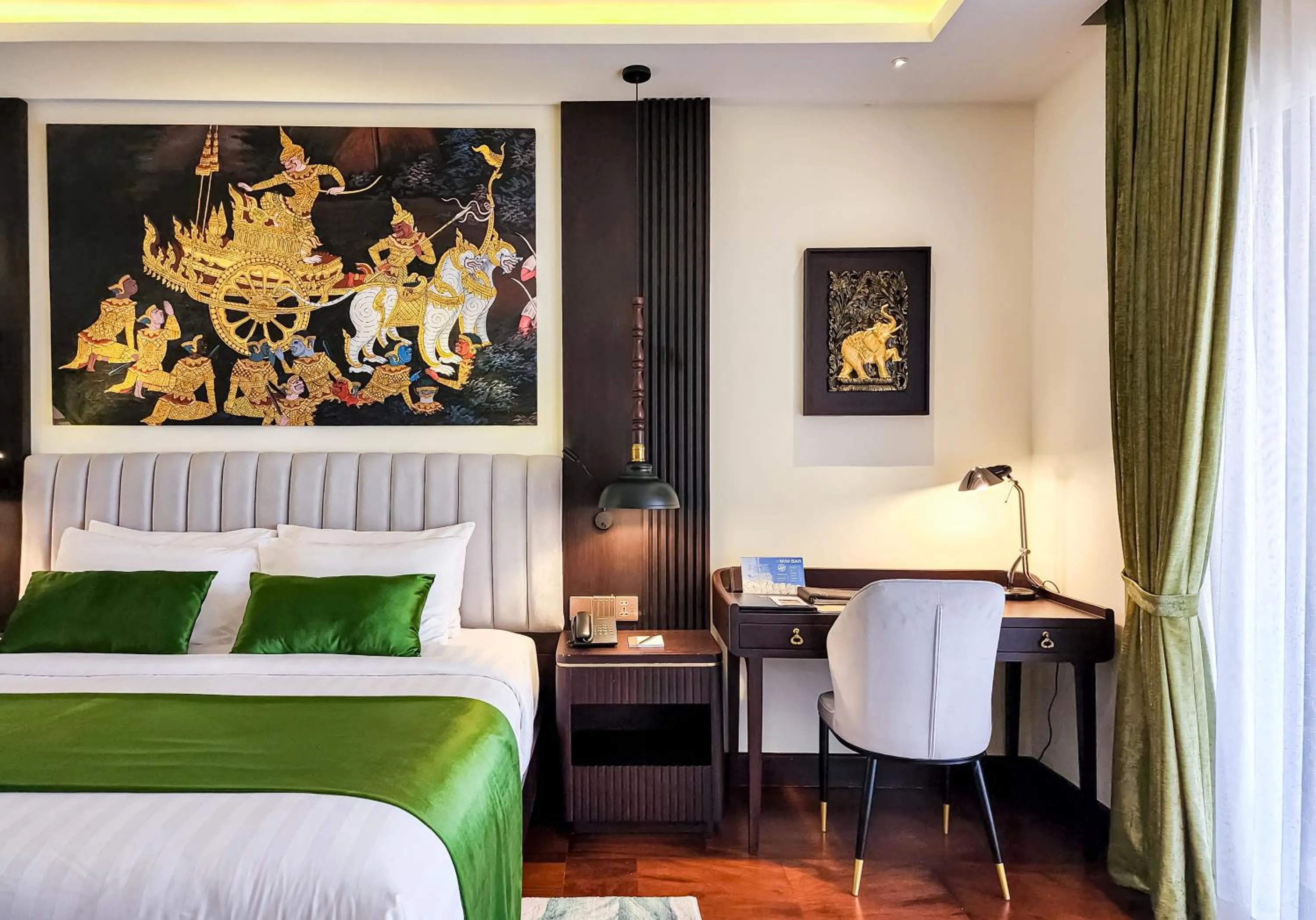 Seating area, Bed in THE PRIVILEGE FLOOR by Borei Angkor