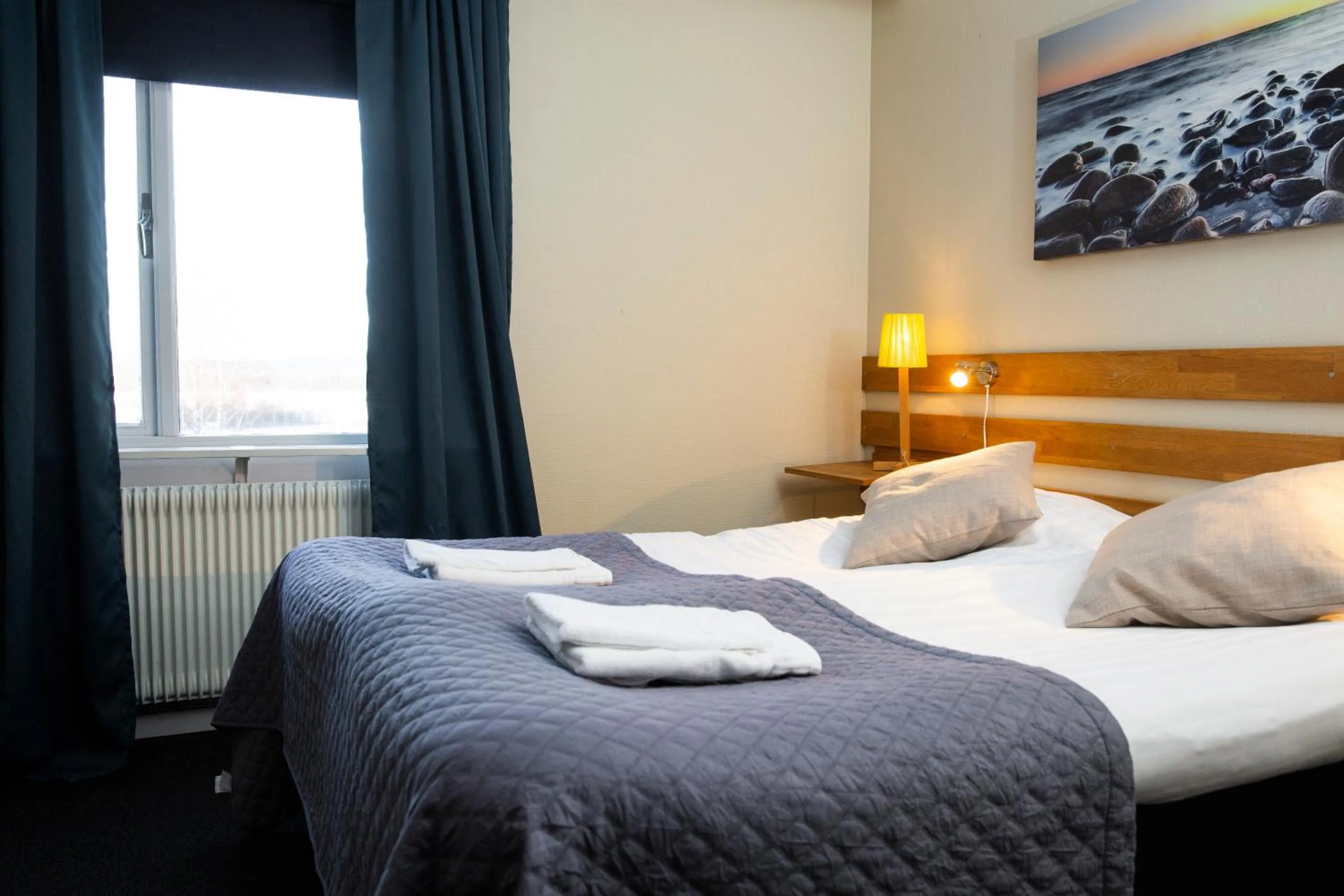 Photo of the whole room, Bed in Hotell Veckefjärden