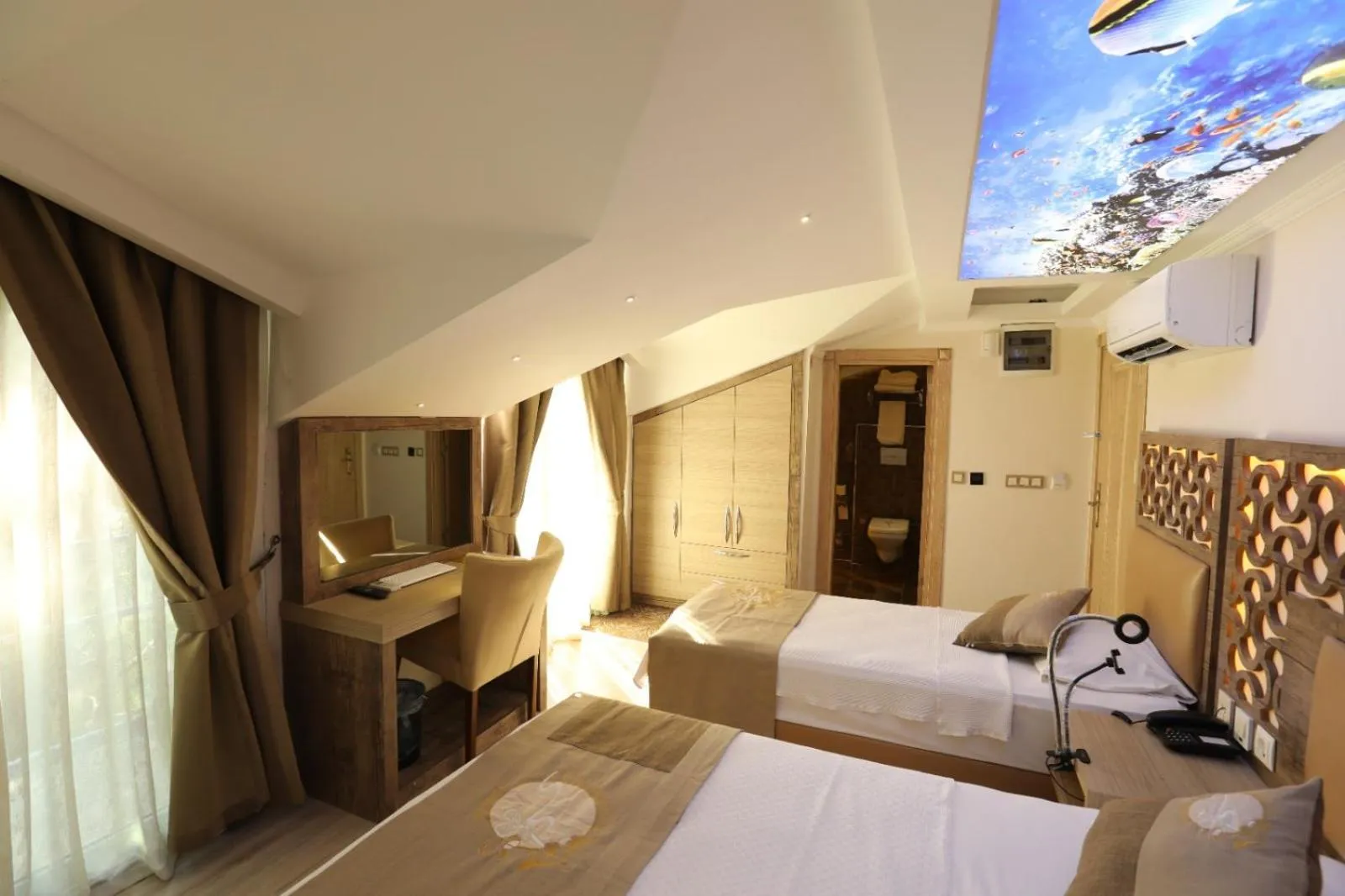 Bed in Unluselek Hotel