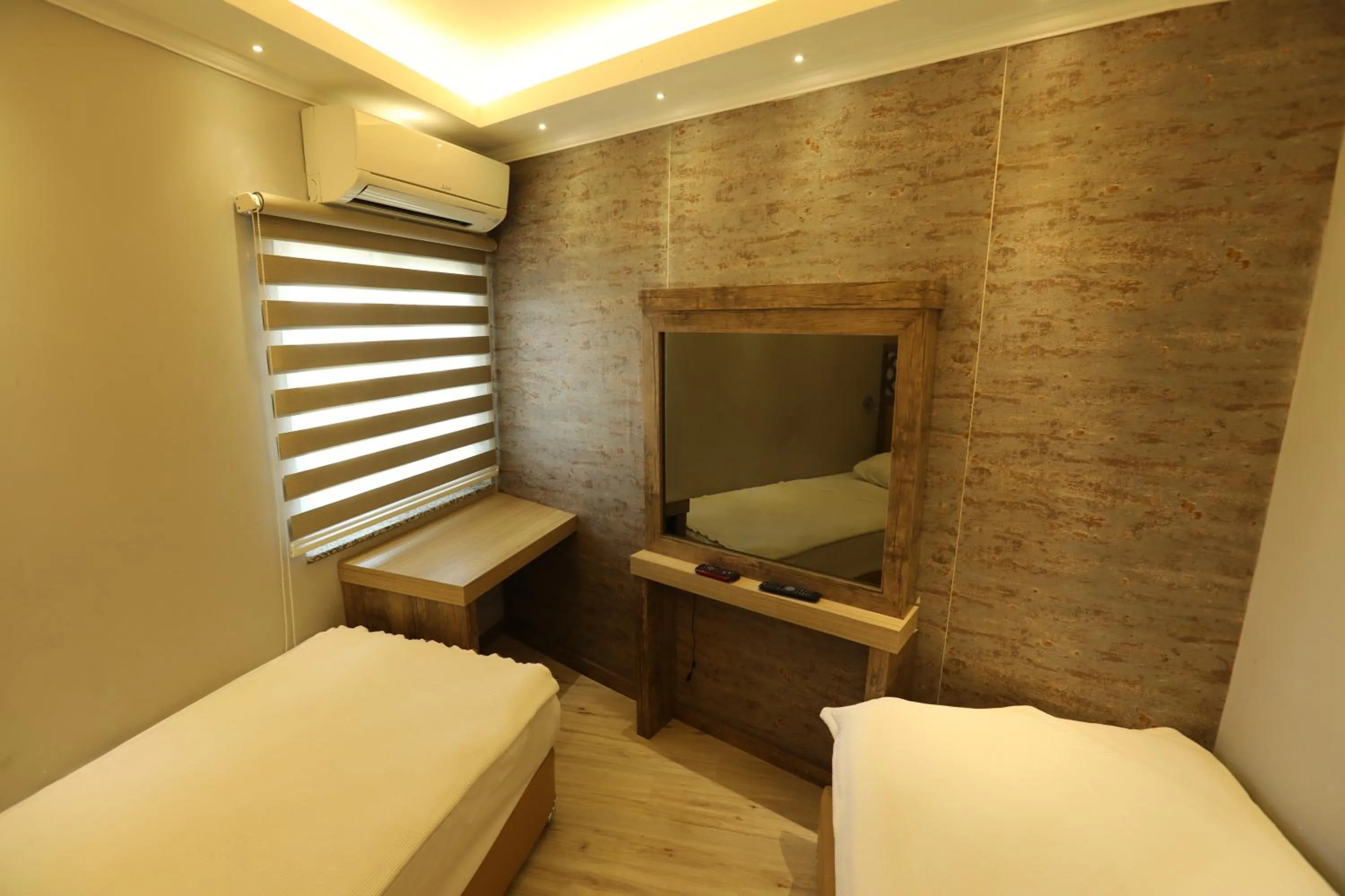 Bed in Unluselek Hotel