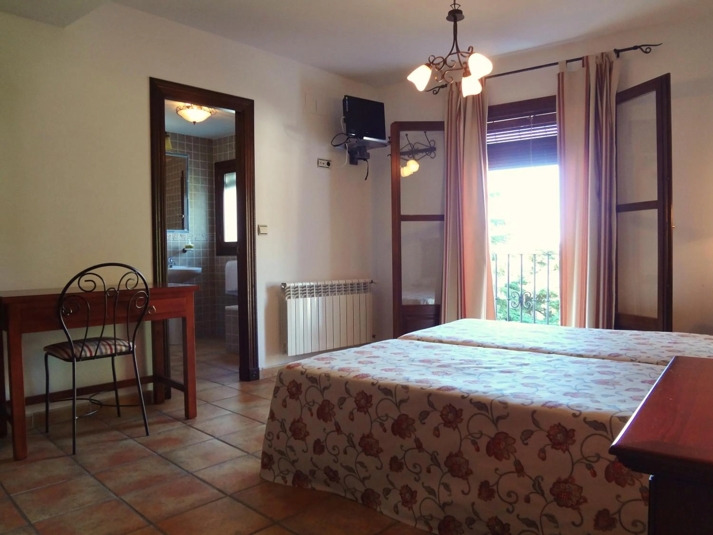 Photo of the whole room, Bed in Hotel Rural Poqueira II