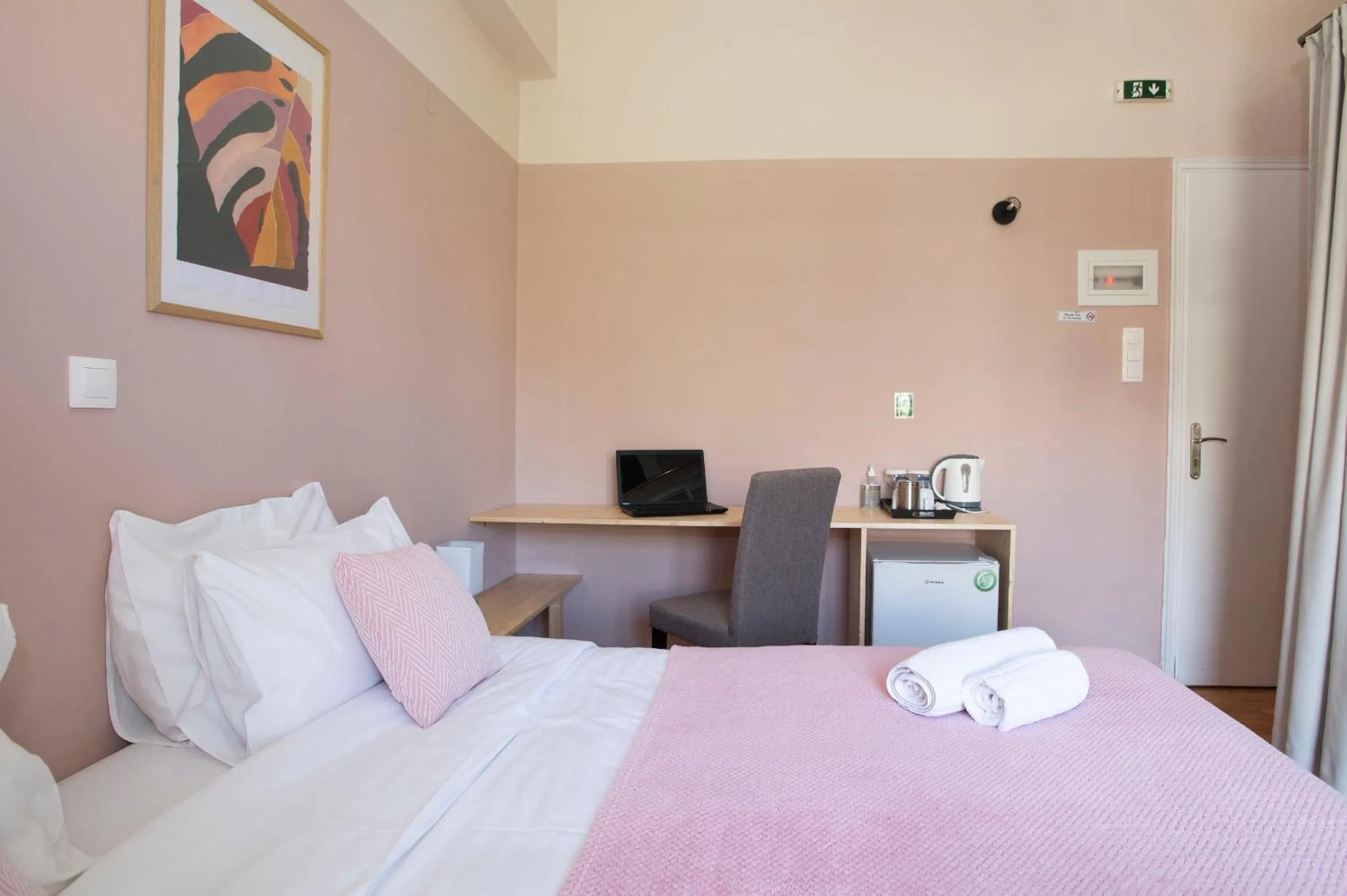 Bed in Kalamata Art Rooms