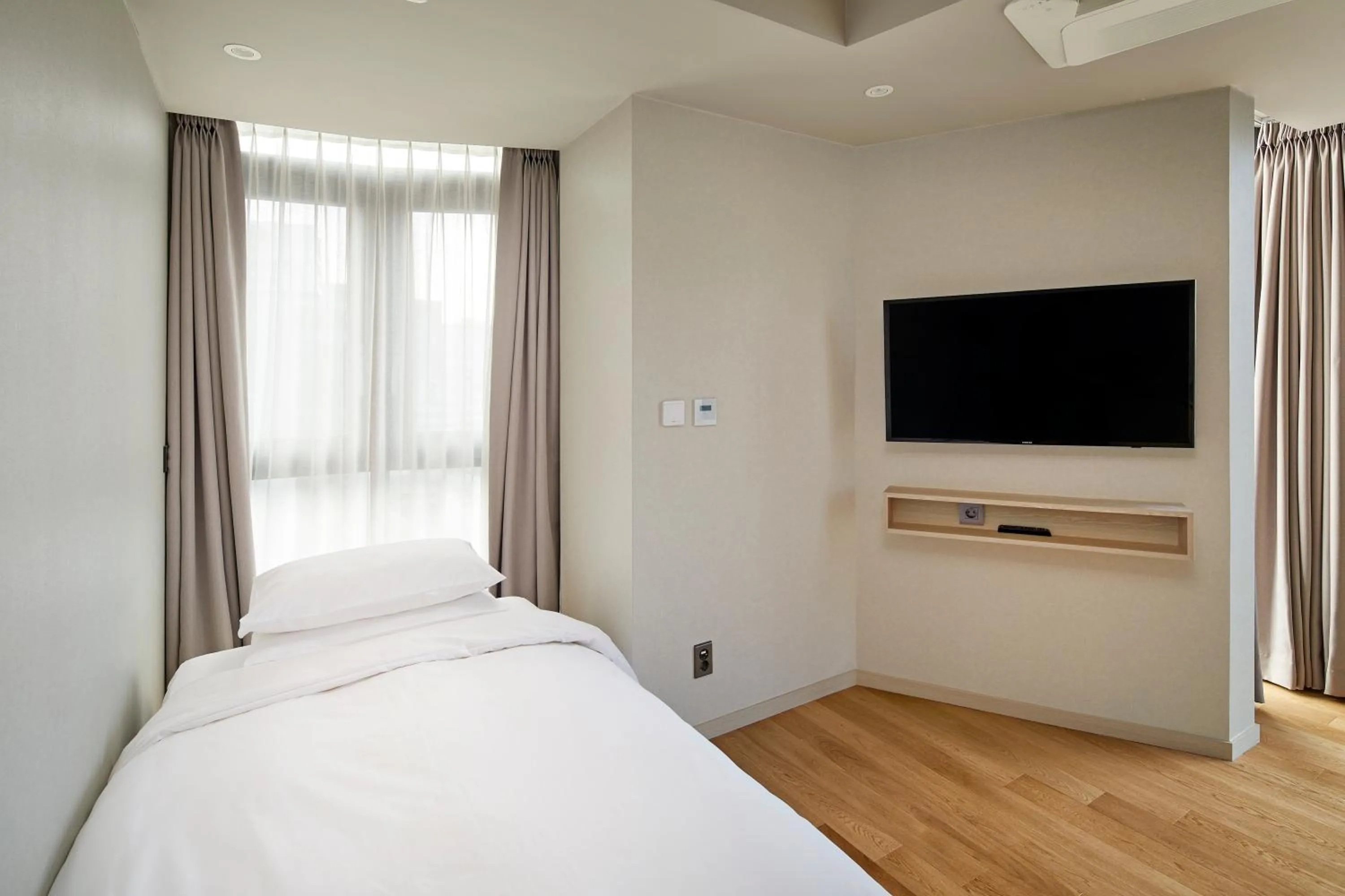 Bedroom, TV/Entertainment Center in Dears Myeongdong