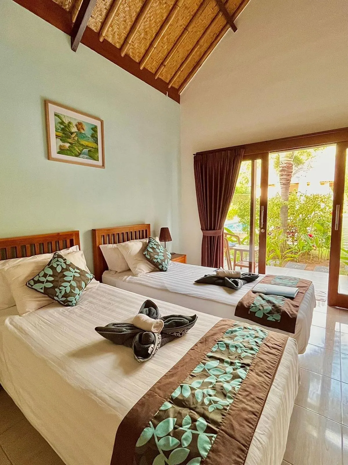 Bed in Cozy Cottages Lombok