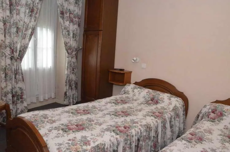 Bed in Hotel du Commerce