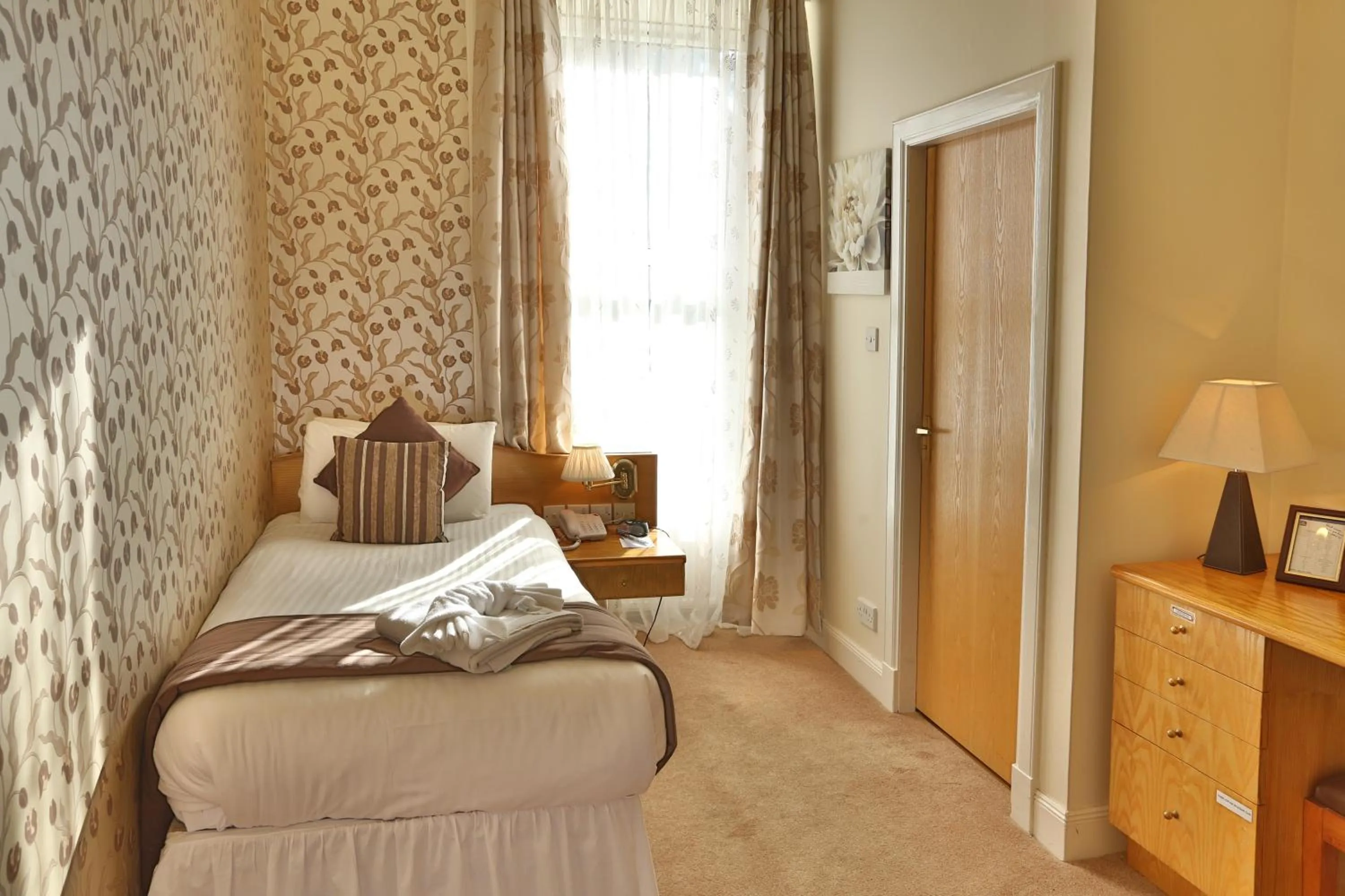 Bed in Woodlands Hotel, BW Signature Collection