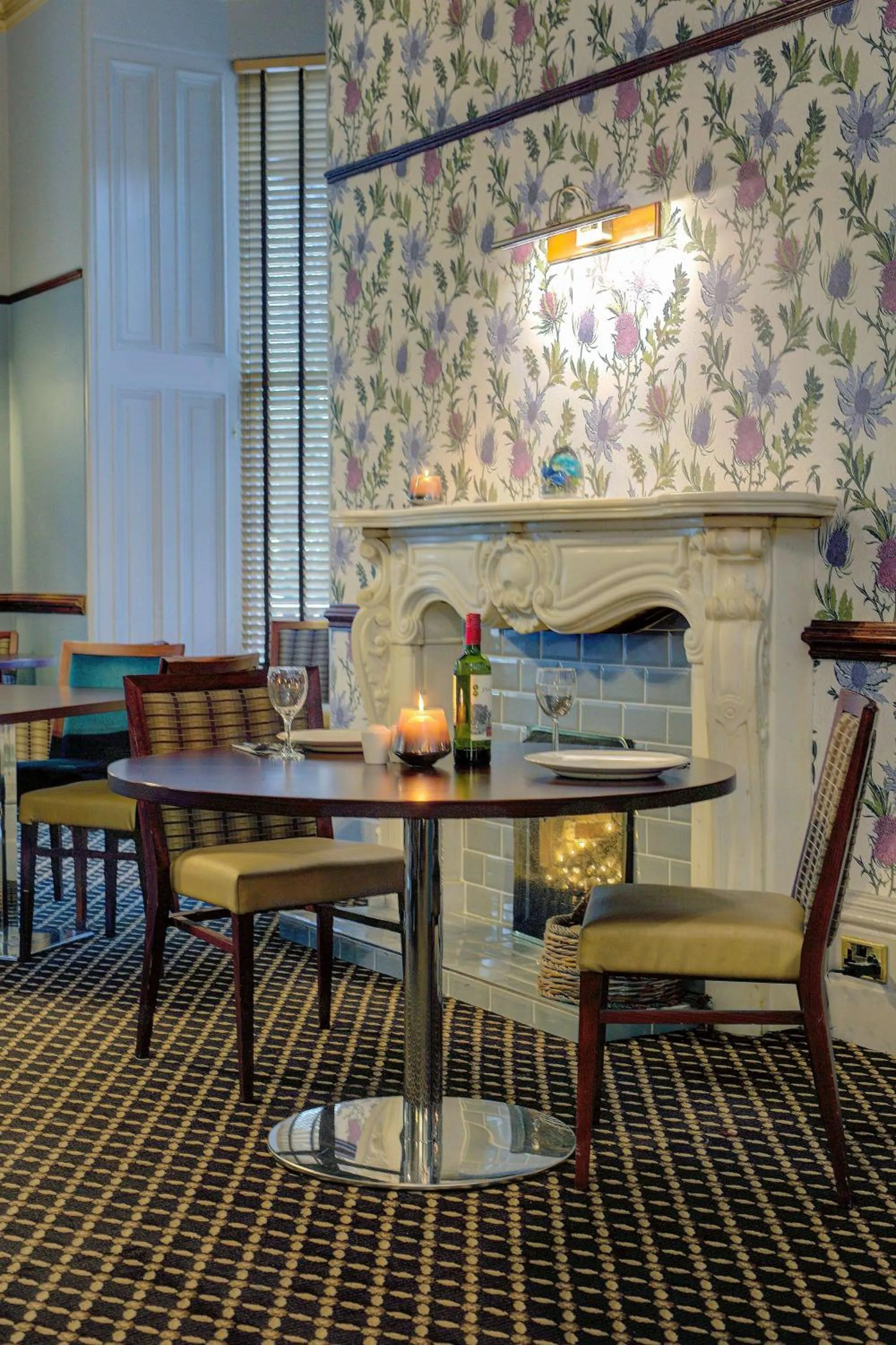 Dining area in Woodlands Hotel, BW Signature Collection
