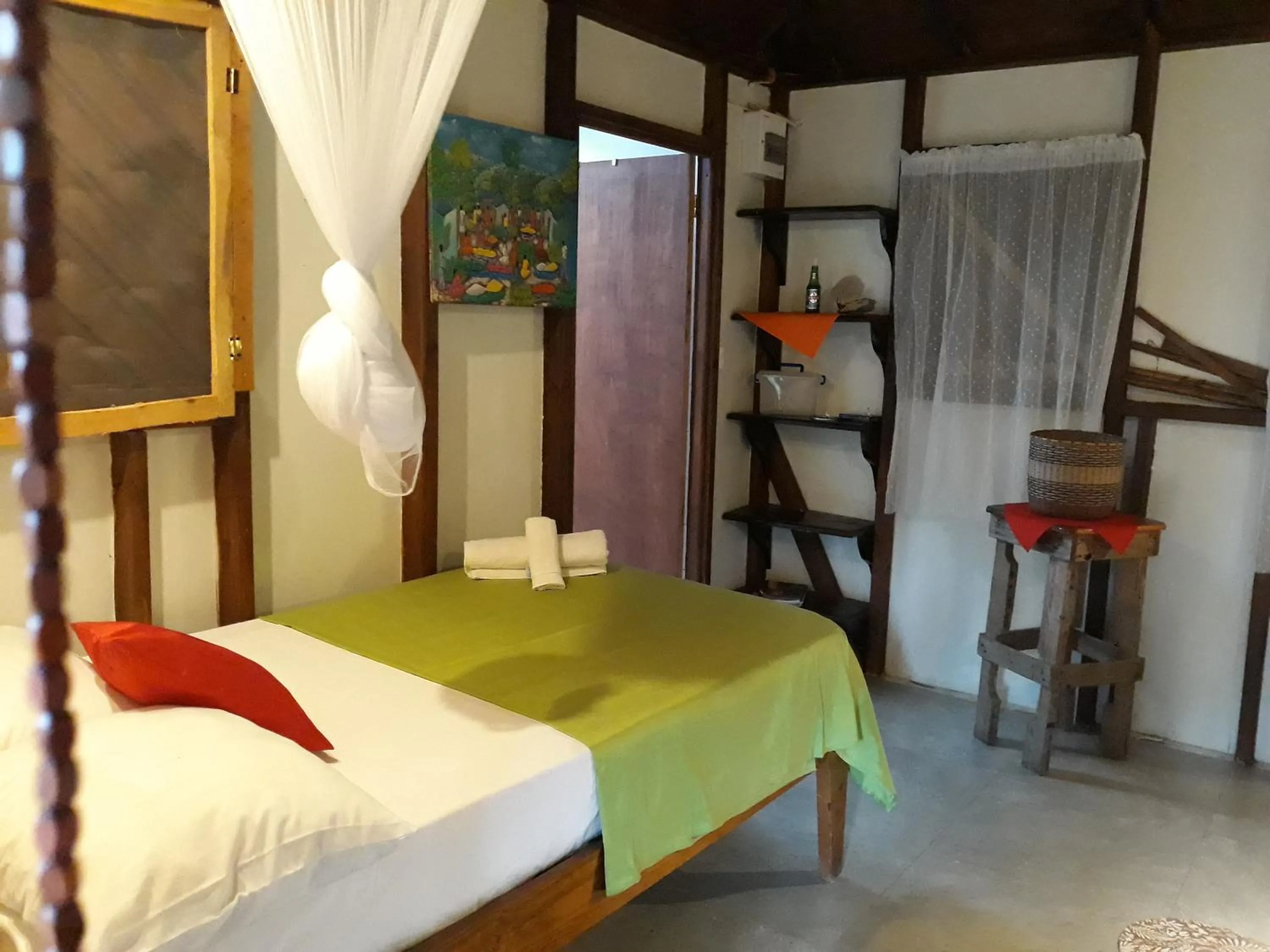 Bed in Hibiscus Valley Inn