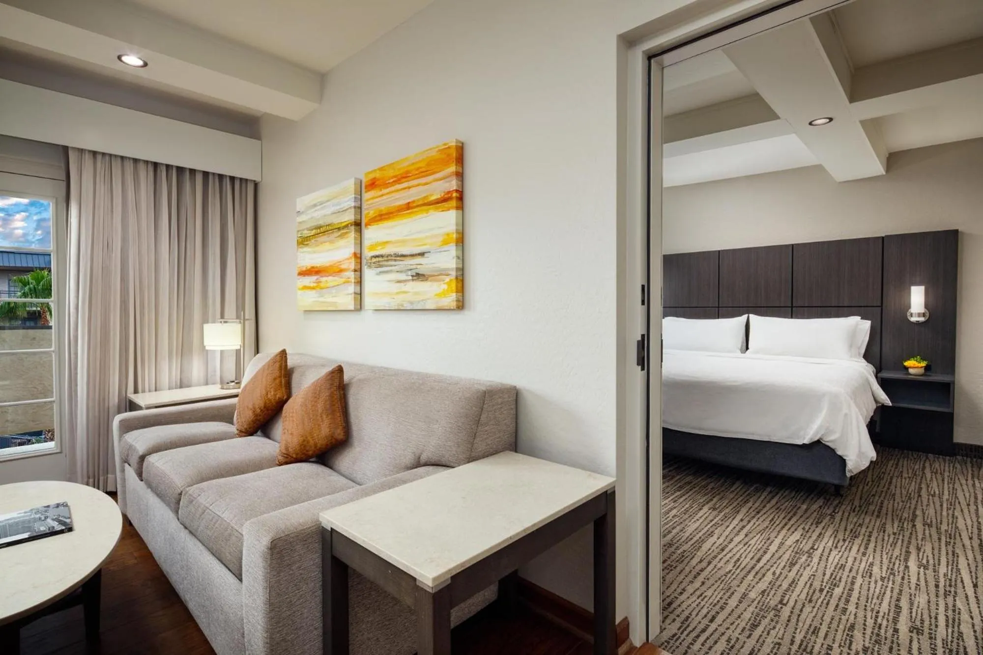 Living room, Bed in Holiday Inn and Suites Phoenix Airport North by IHG