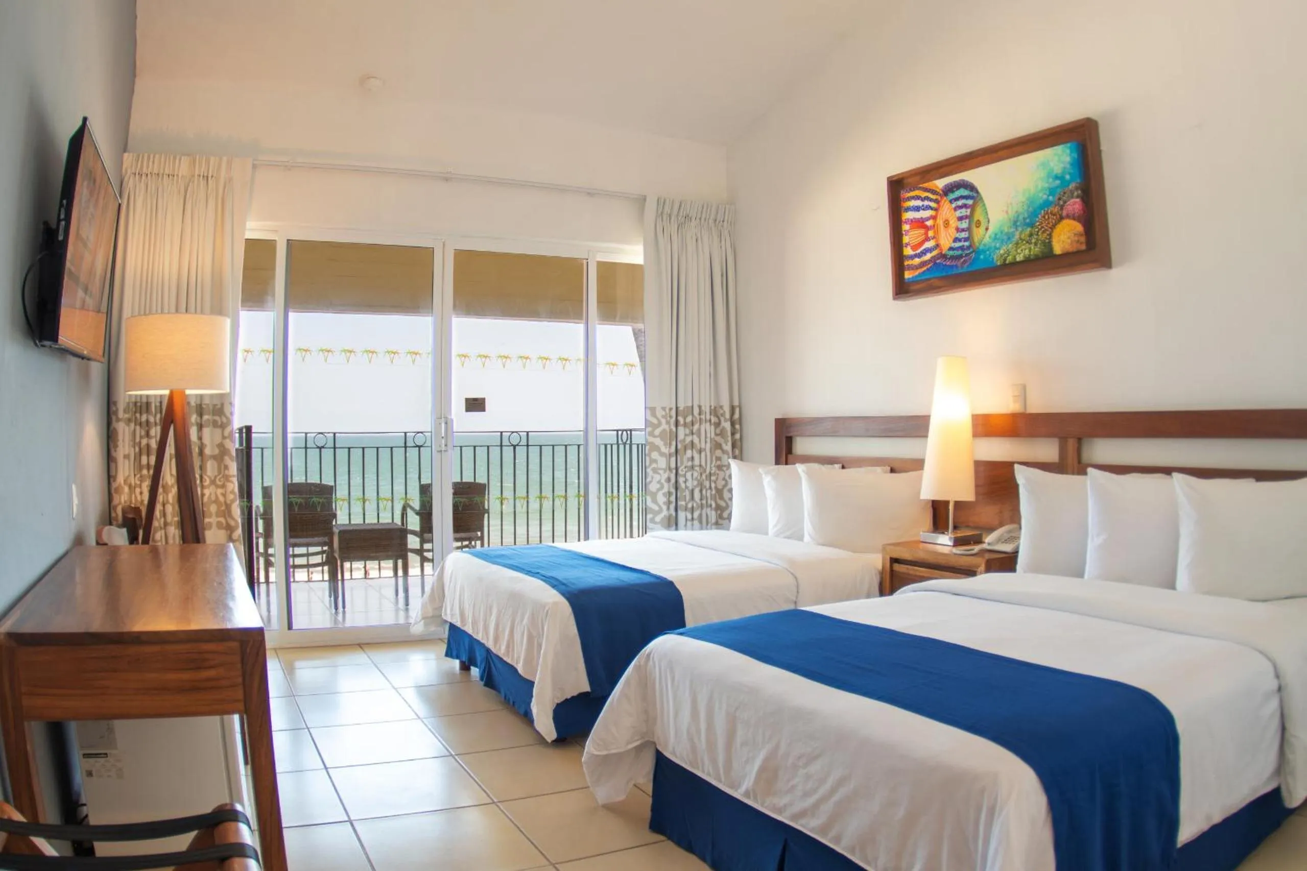 Photo of the whole room, Bed in Grand Decameron Complex Bucerias, A Trademark All-Inclusive Resort
