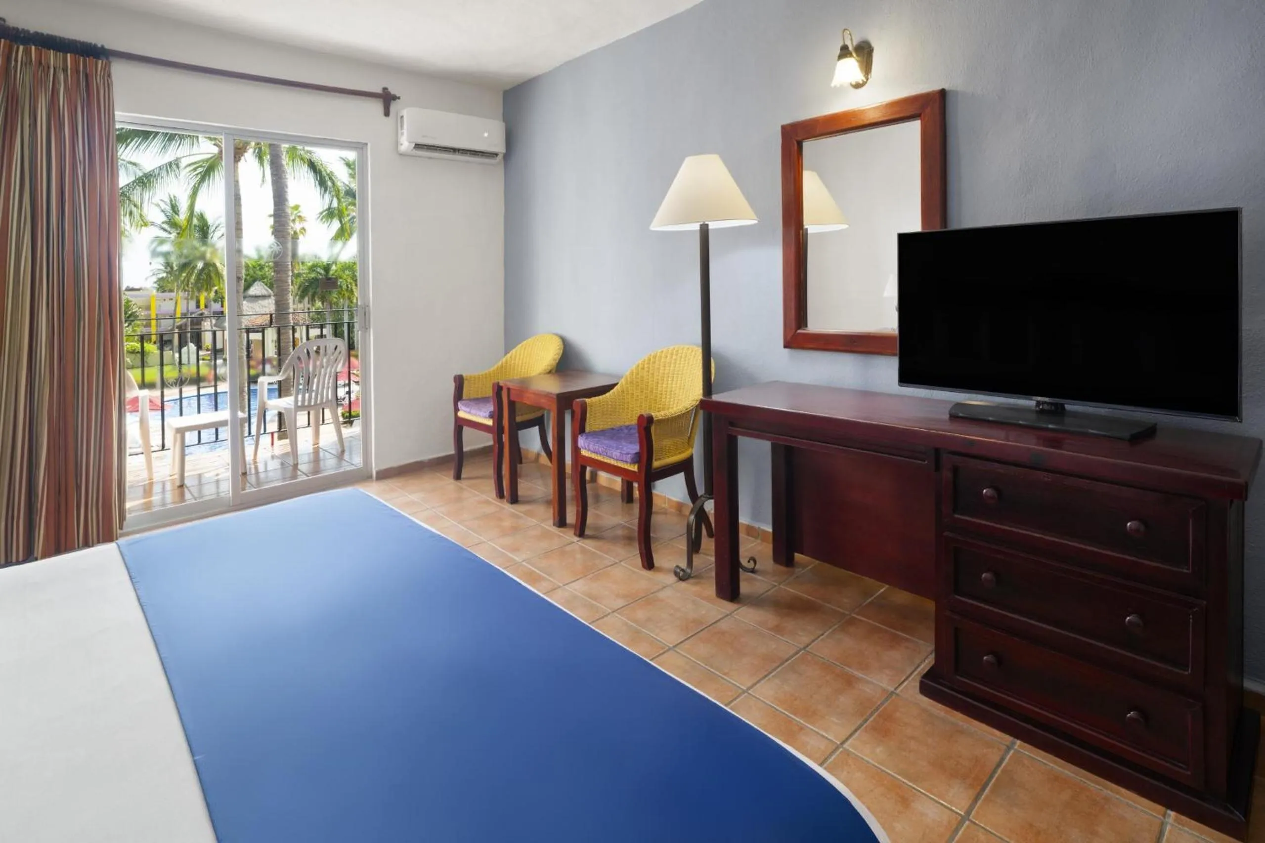 Bed in Grand Decameron Complex Bucerias, A Trademark All-Inclusive Resort