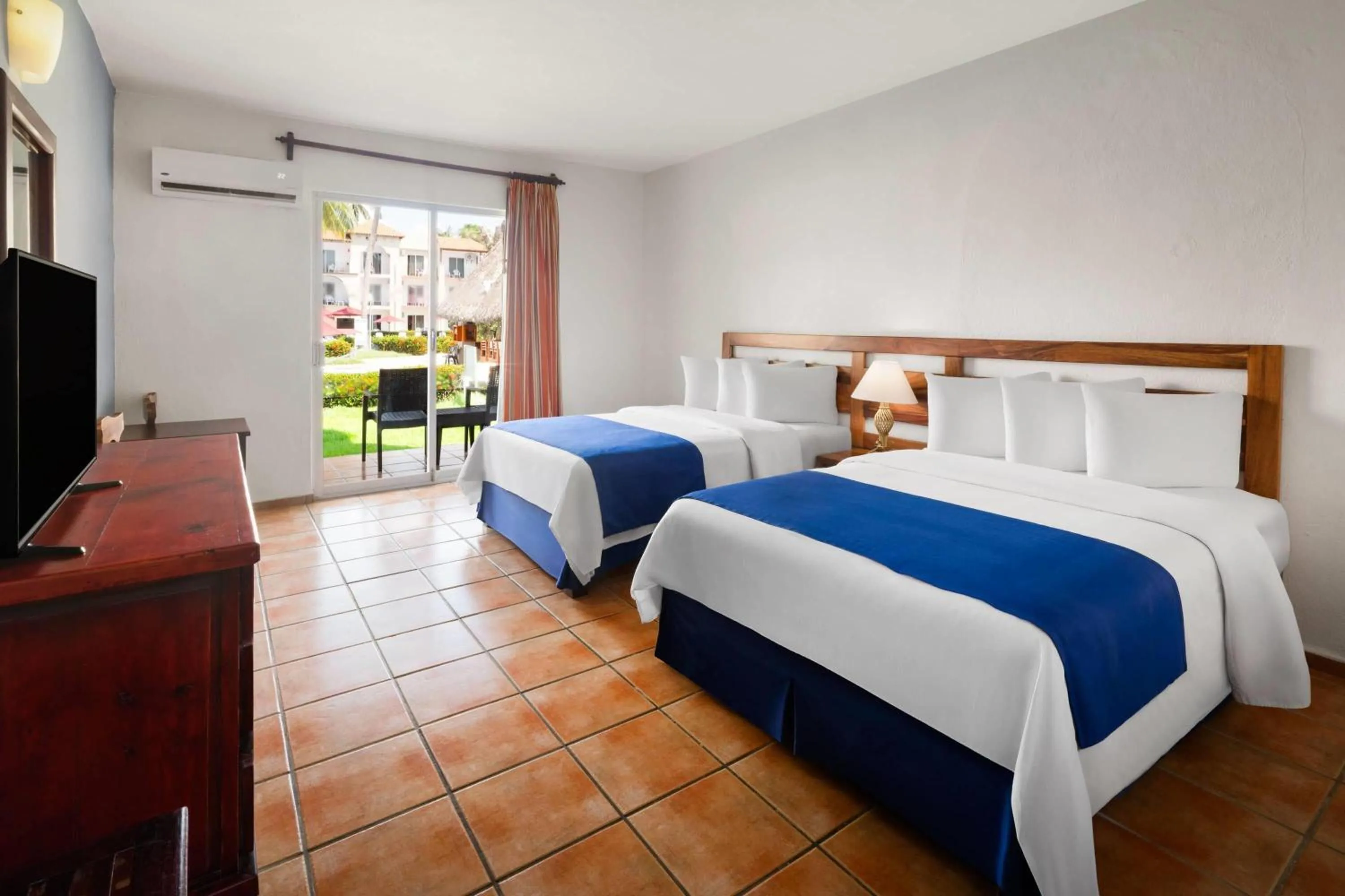 Photo of the whole room, Bed in Grand Decameron Complex Bucerias, A Trademark All-Inclusive Resort