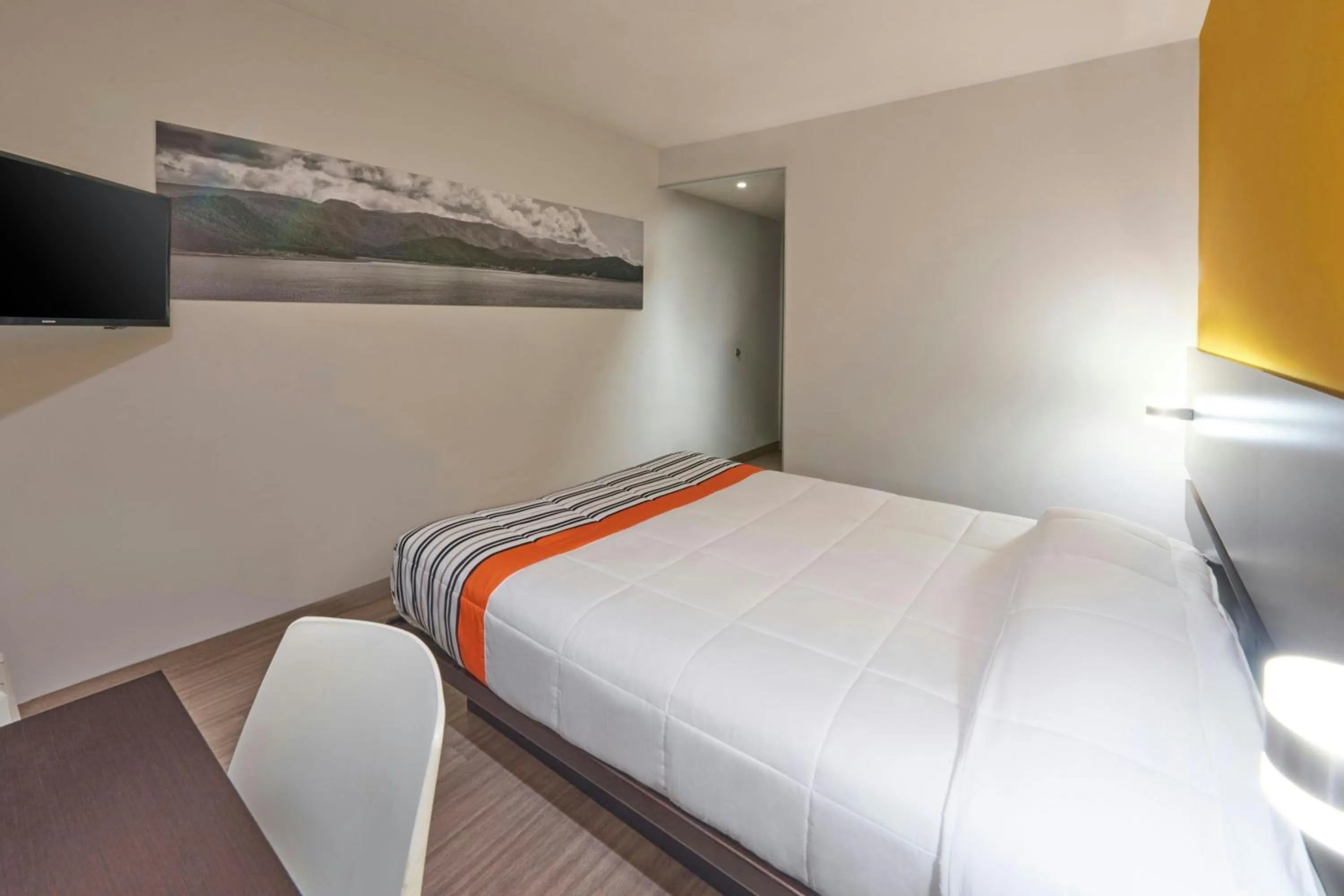 Bedroom, Bed in City Express Junior by Marriott Mexicali