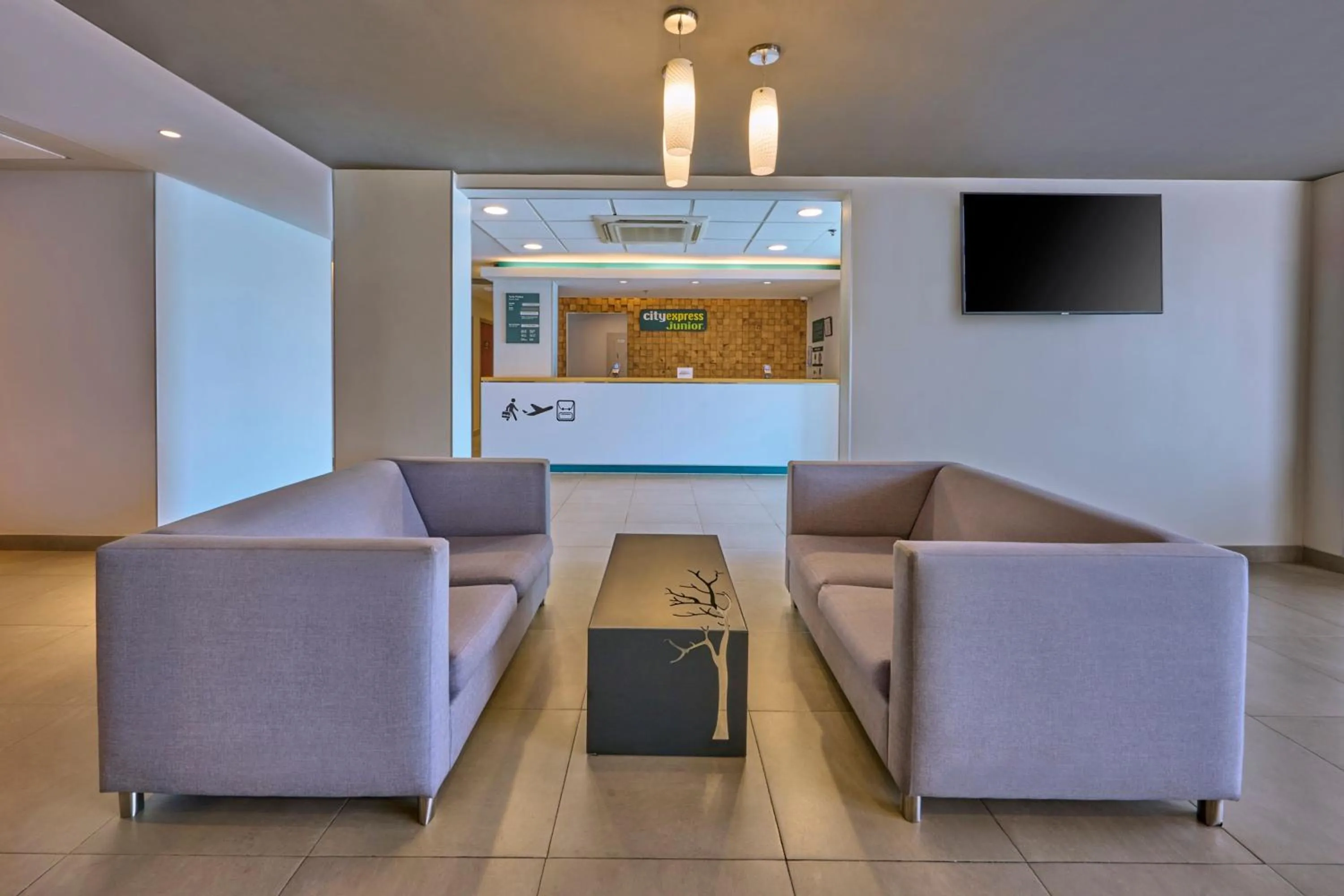 Lobby or reception in City Express Junior by Marriott Mexicali