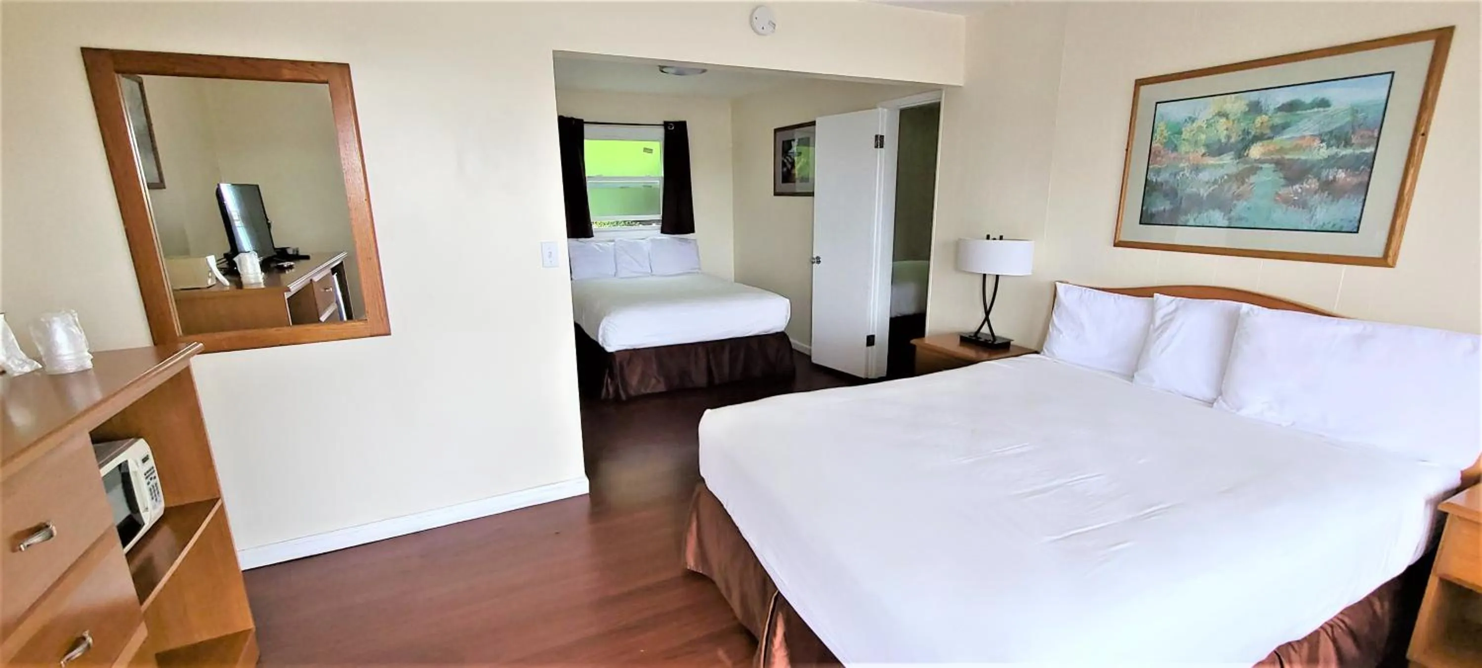 Photo of the whole room, Bed in Blue Coast Inn & Suites