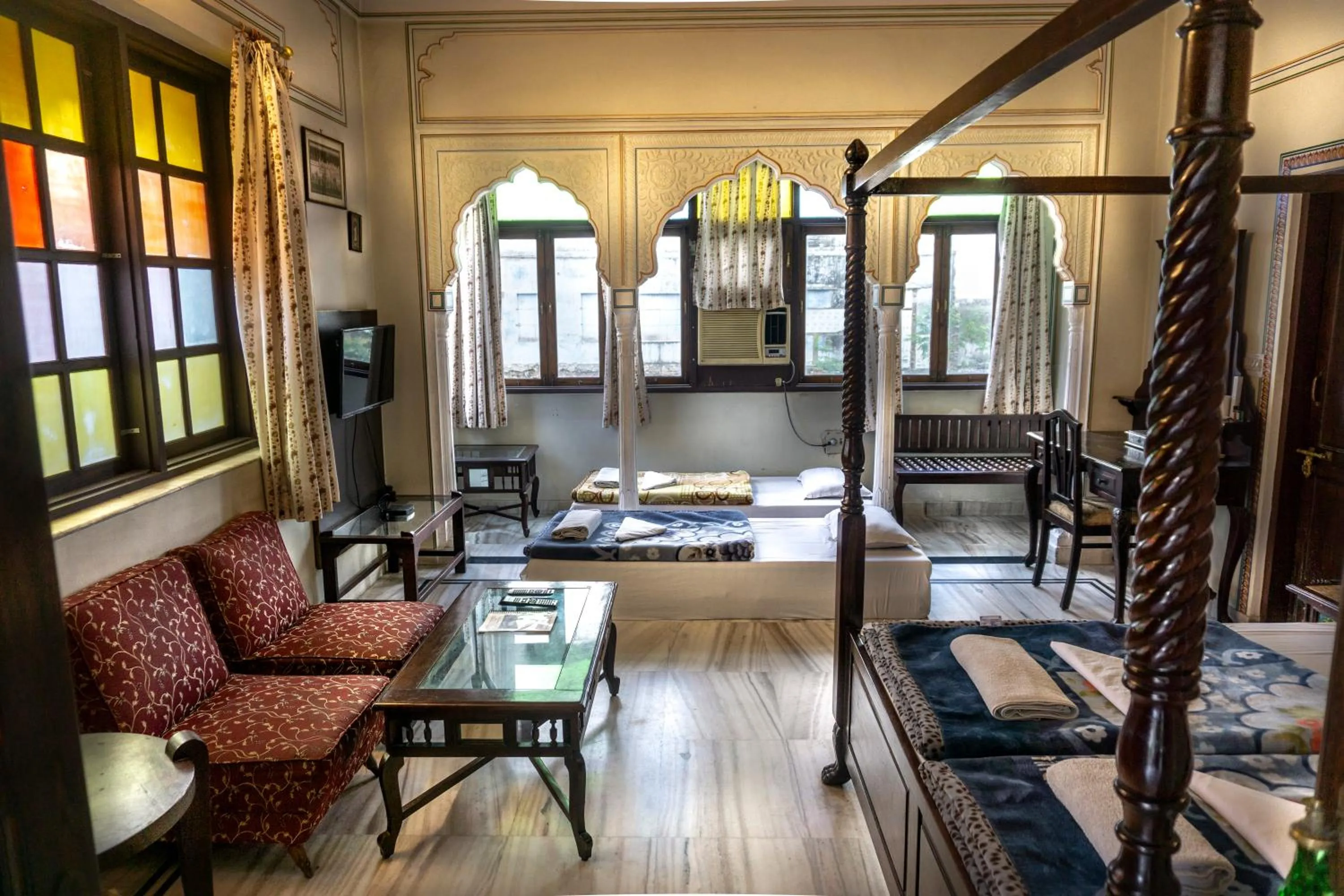 Bed in Krishna Palace - A Heritage Boutique Hotel