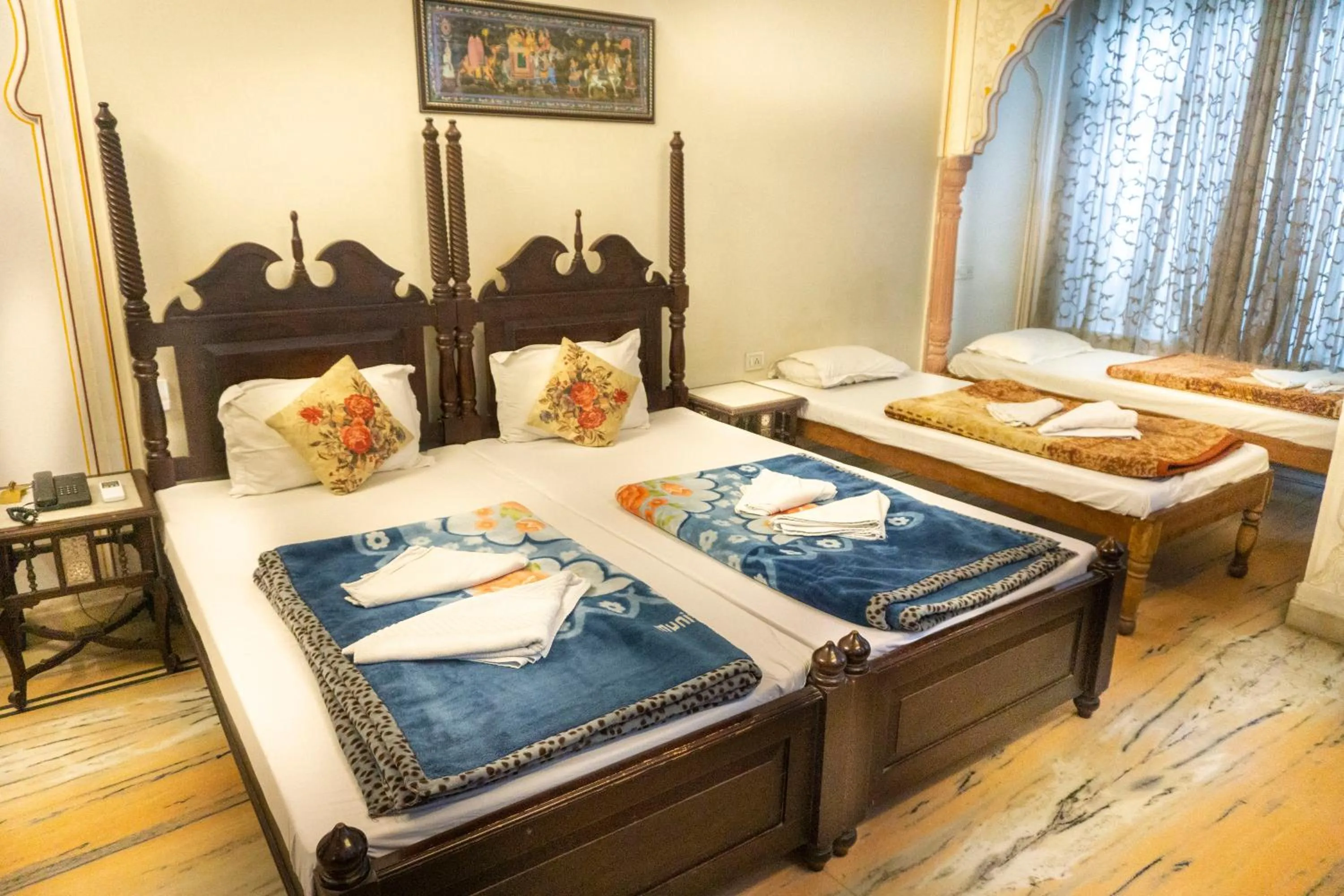 Bed in Krishna Palace - A Heritage Boutique Hotel