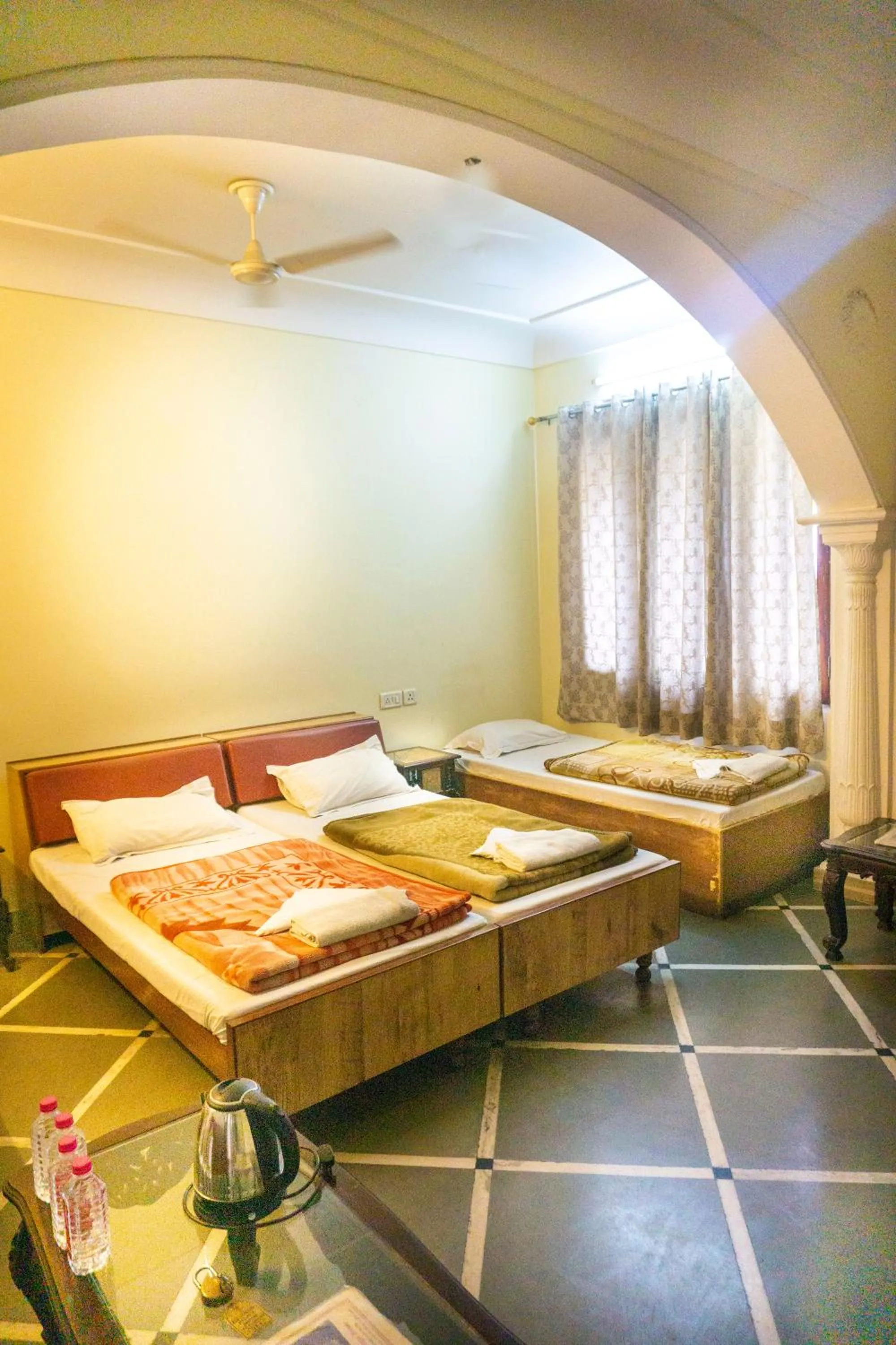 Bed in Krishna Palace - A Heritage Boutique Hotel