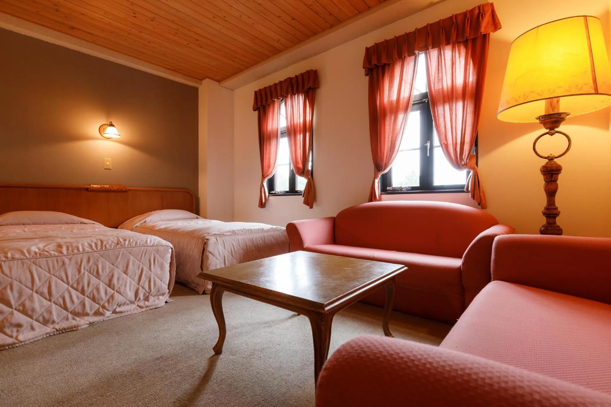 Bed in ホテルけやきの樹