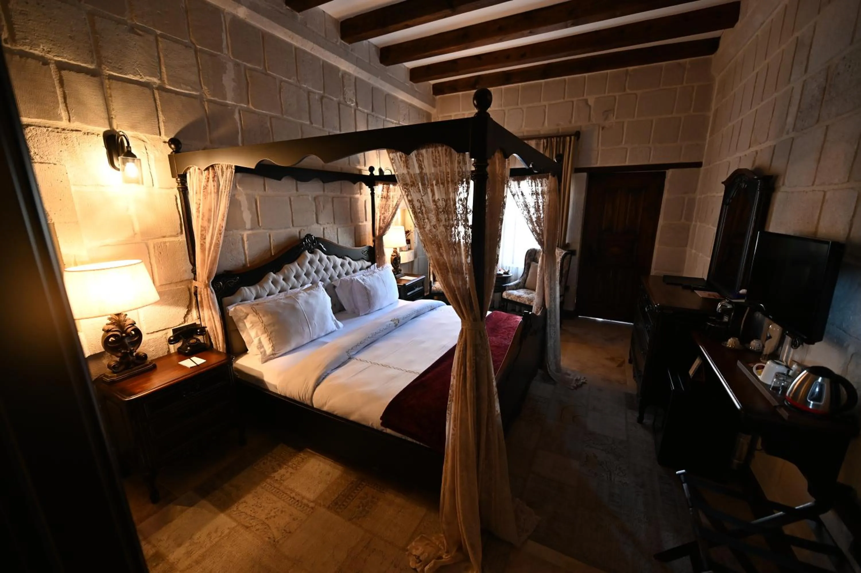 Photo of the whole room, Bed in Seraphim Cave Suites & SPA