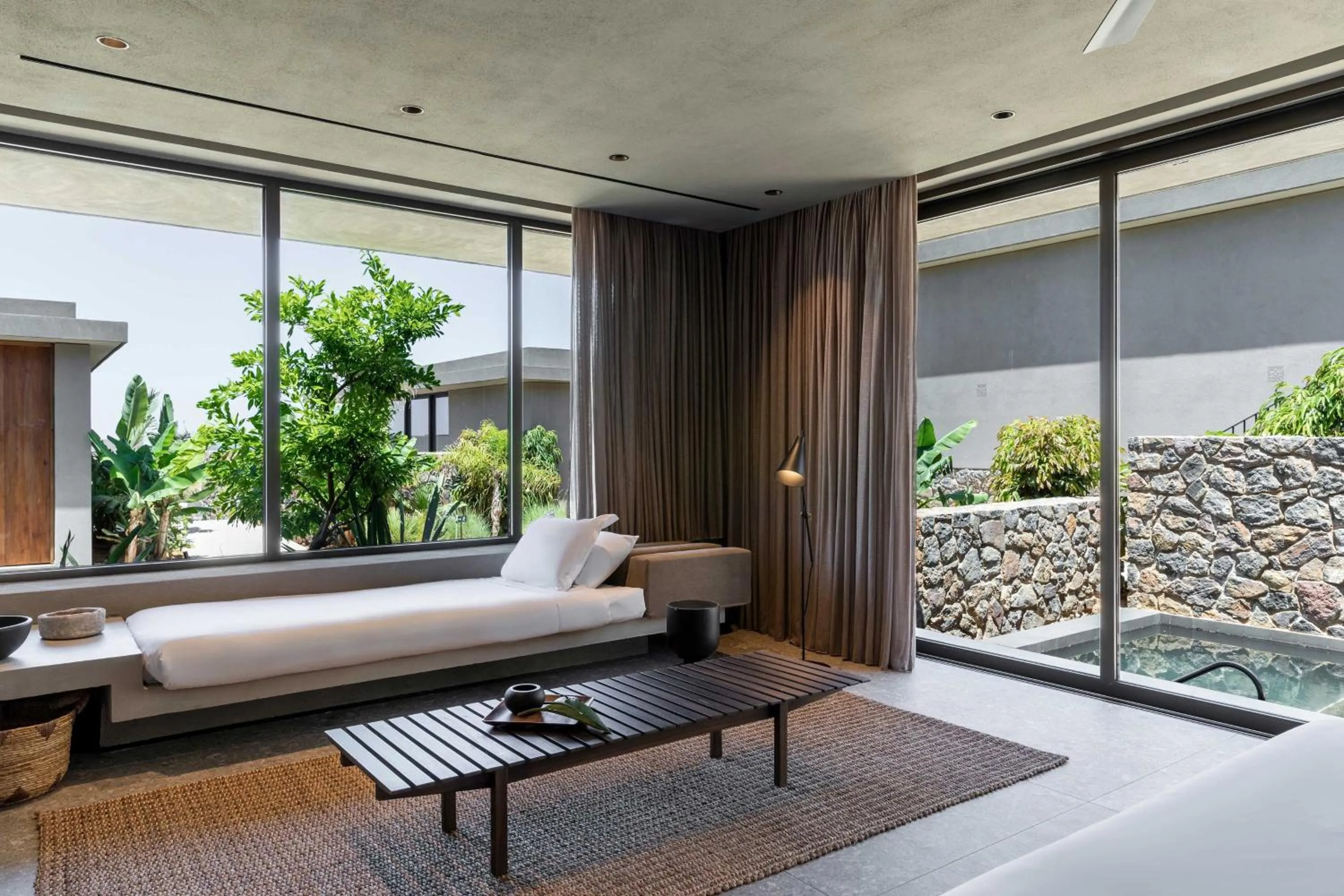 Living room, Bed in Domes Zeen Chania, a Luxury Collection Resort, Crete