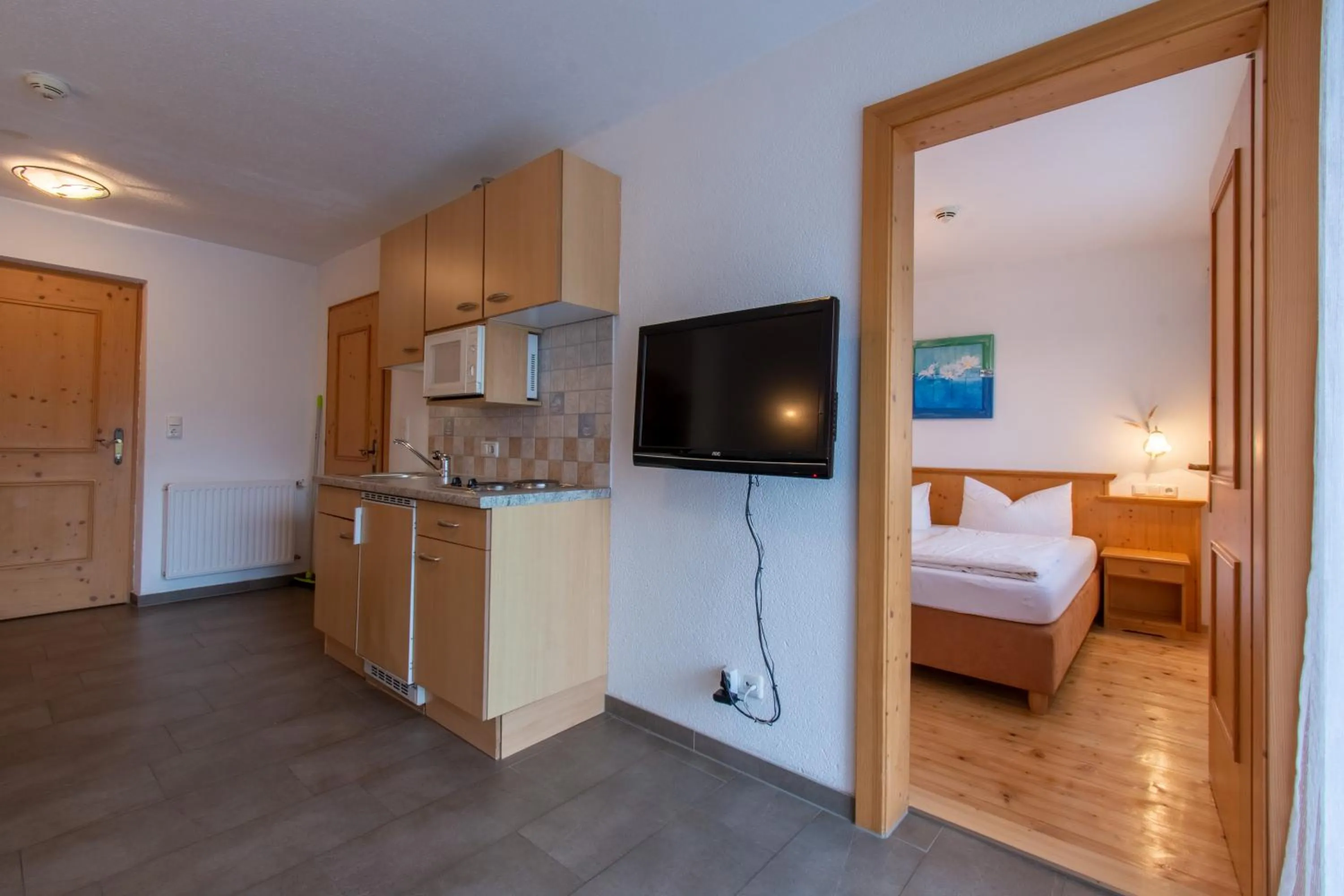 Kitchen or kitchenette, Bed in Pension Noella