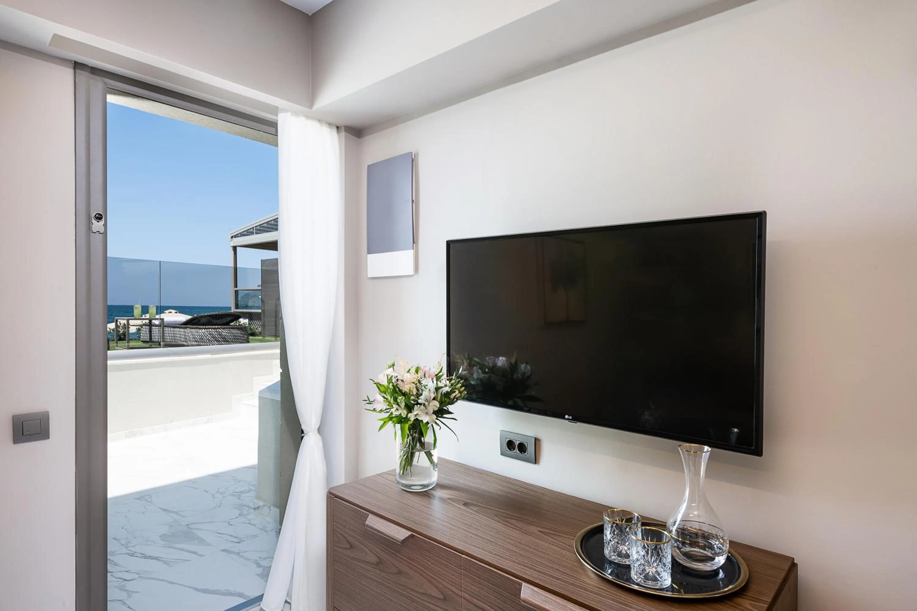 TV and multimedia in Porto Platanias Beach Luxury Selection - Adults Only