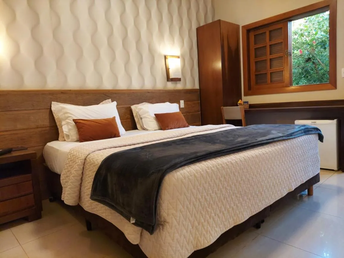 Bed in Hotel Pousada Santa Rita