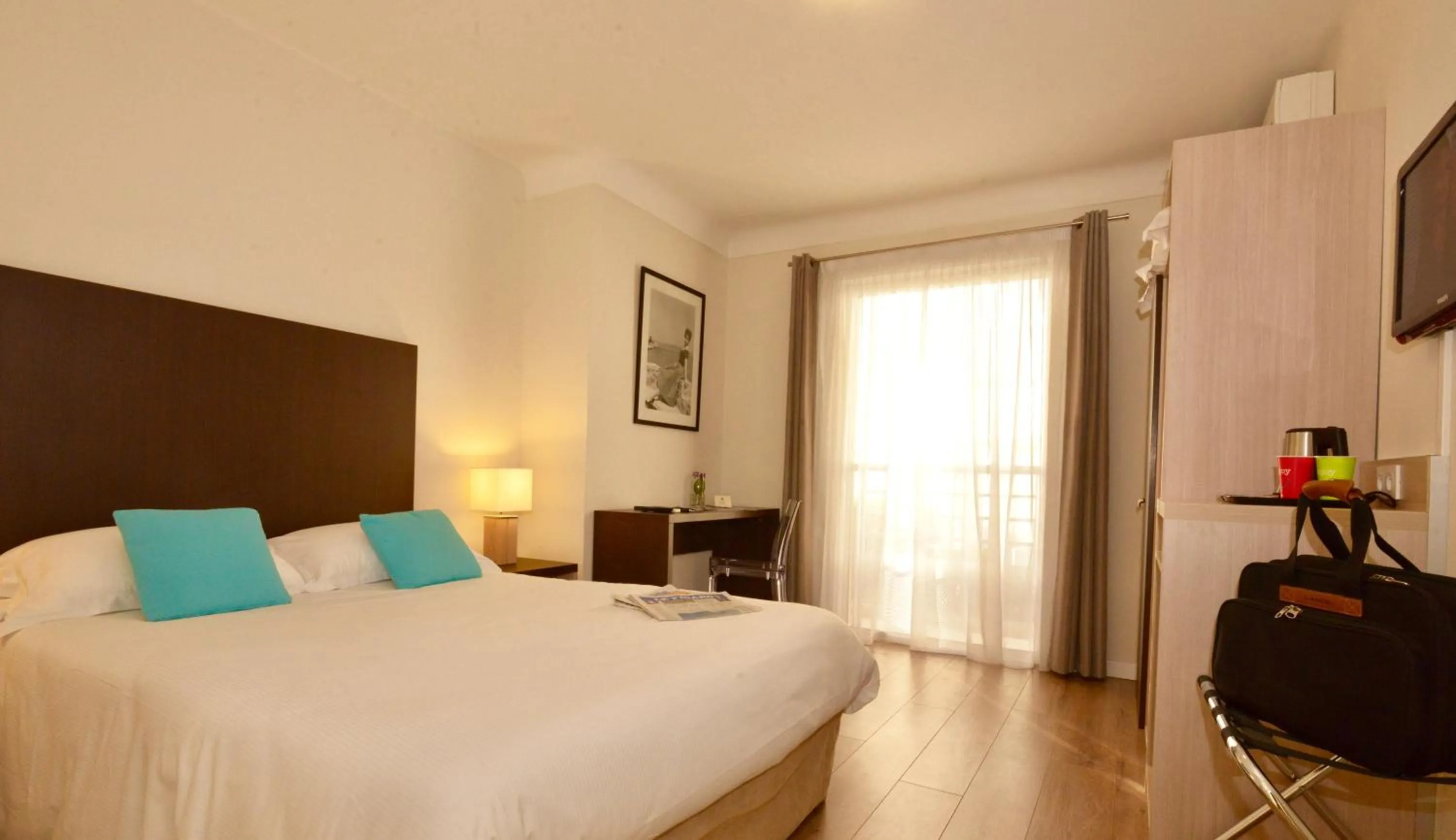 Bed in Hôtel Villa Sophia - ADULTS ONLY JULY AND AUGUST