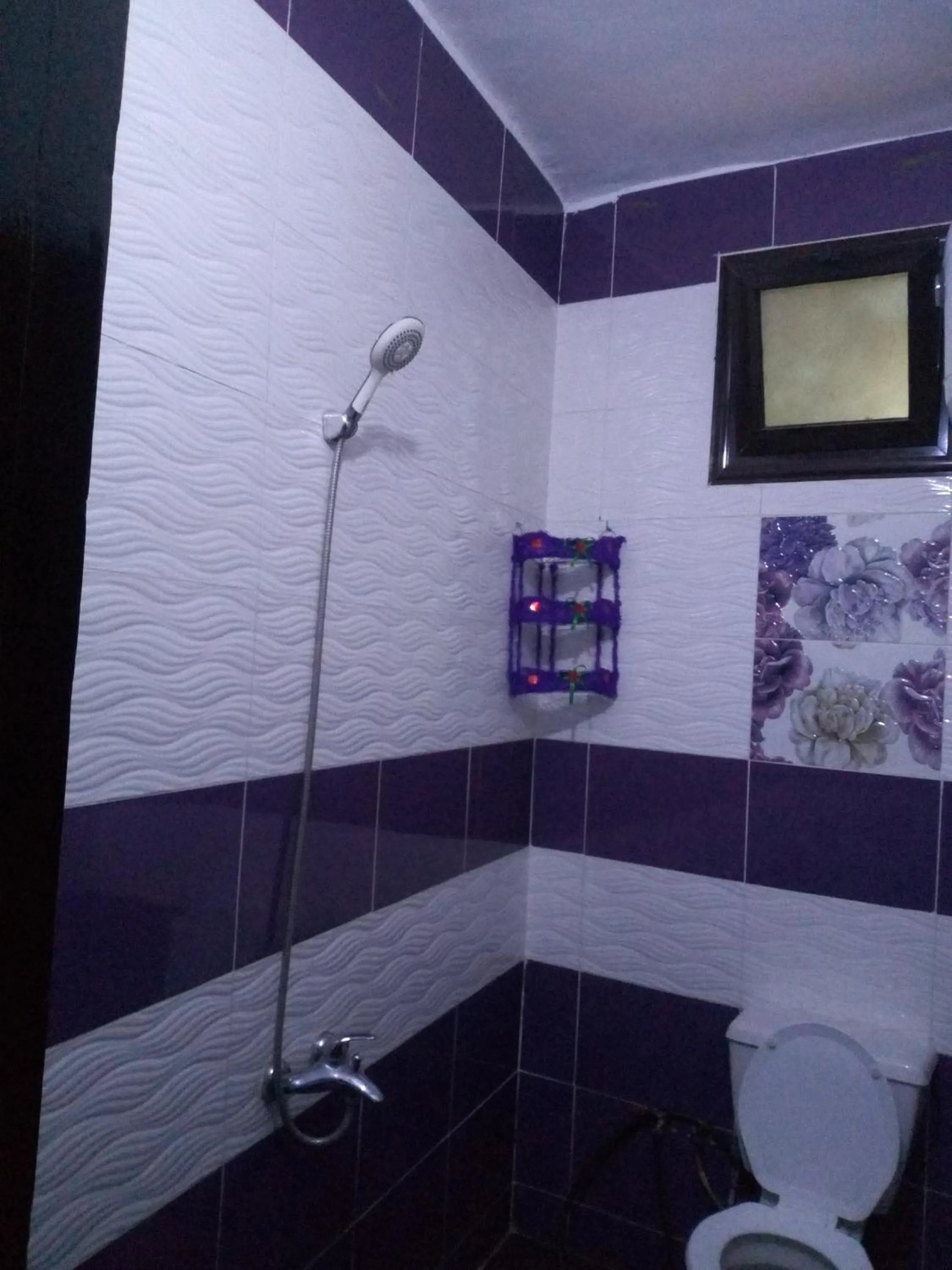 Toilet in Awi Guest House