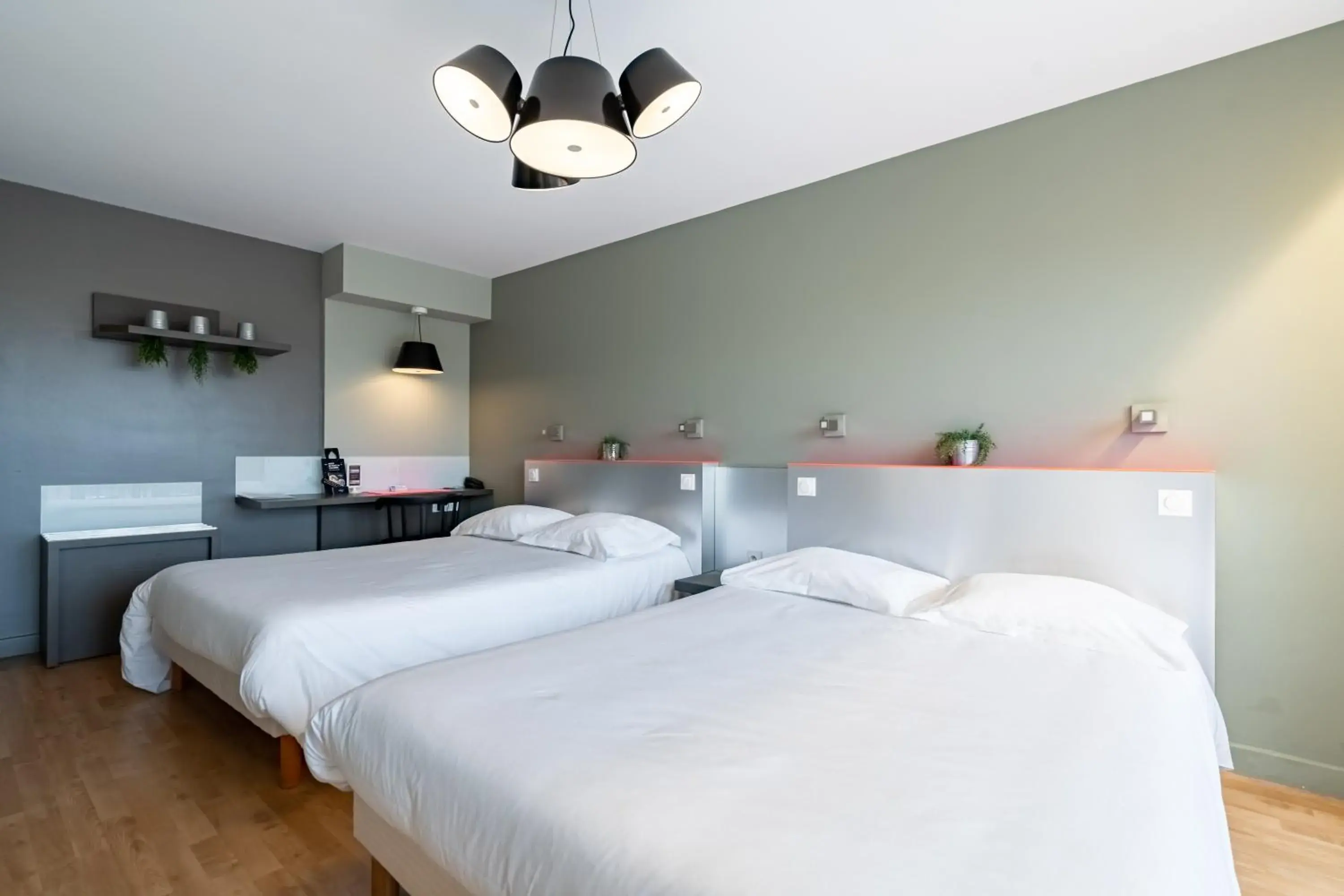 Superior Quadruple Room in Hôtel Vulcain Superior Quadruple Room in Hôtel Vulcain