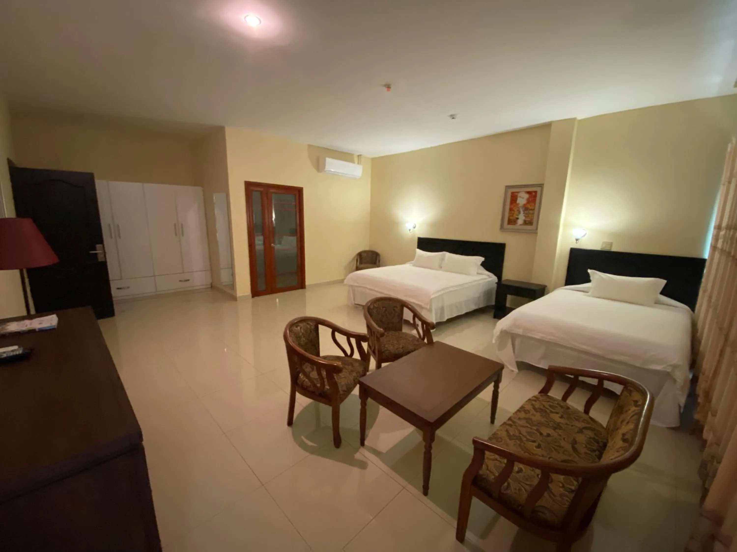 Living room, Bed in Hotel F Sur Inn