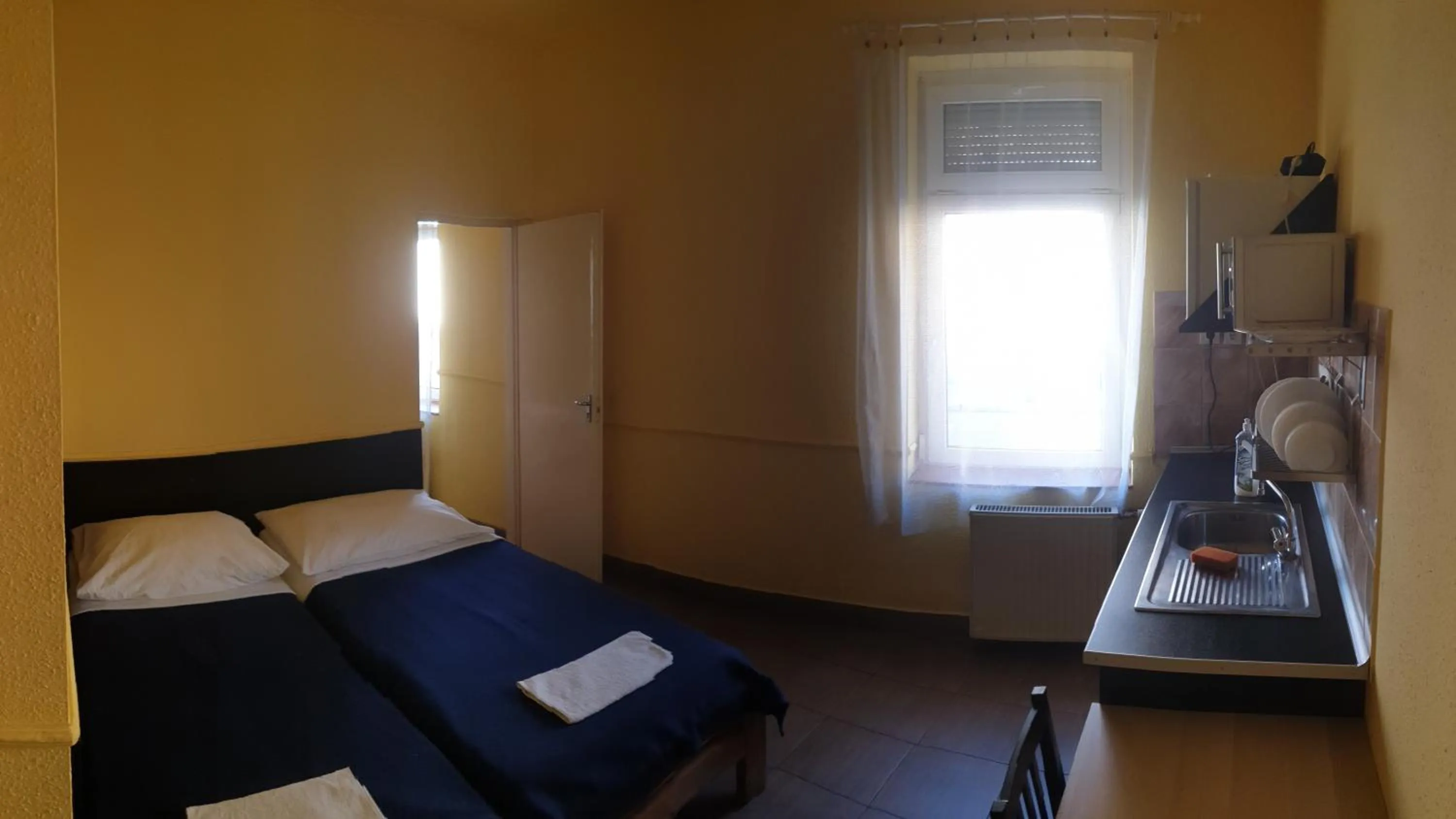 Photo of the whole room, Bed in Jáde Panzió