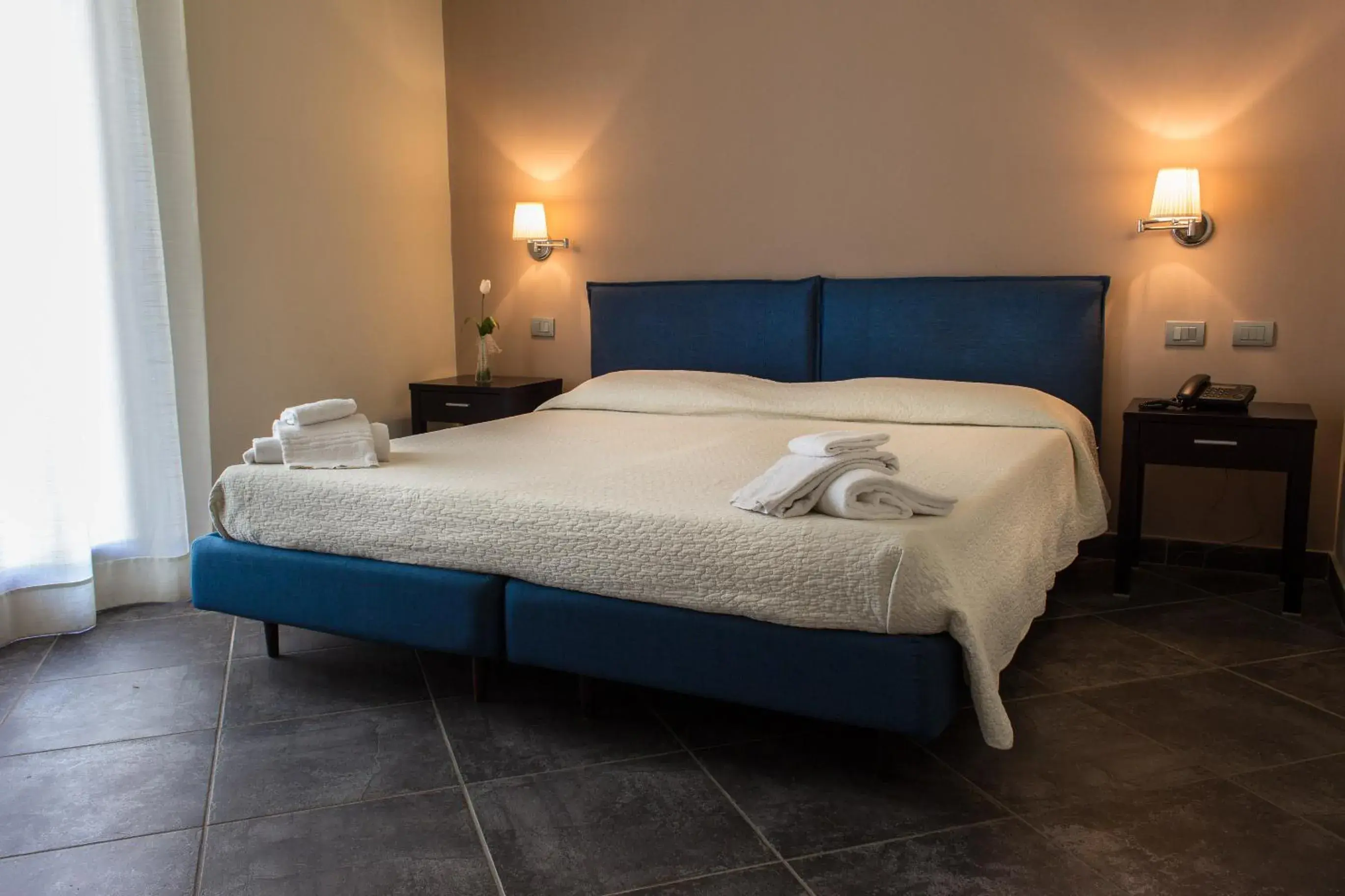 Triple Room in Hotel La Cavalera Triple Room in Hotel La Cavalera