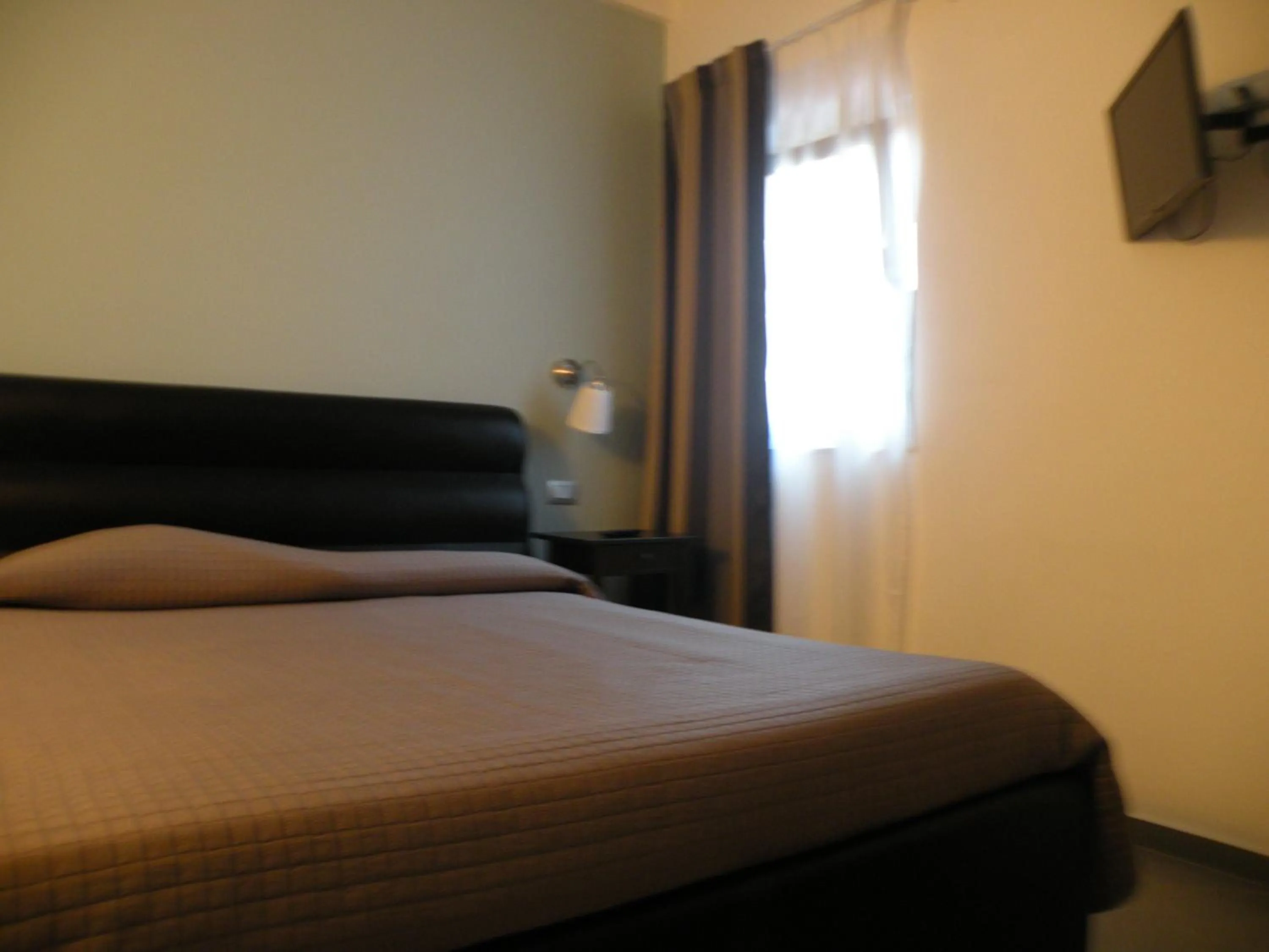 Bed in Hotel La Cavalera