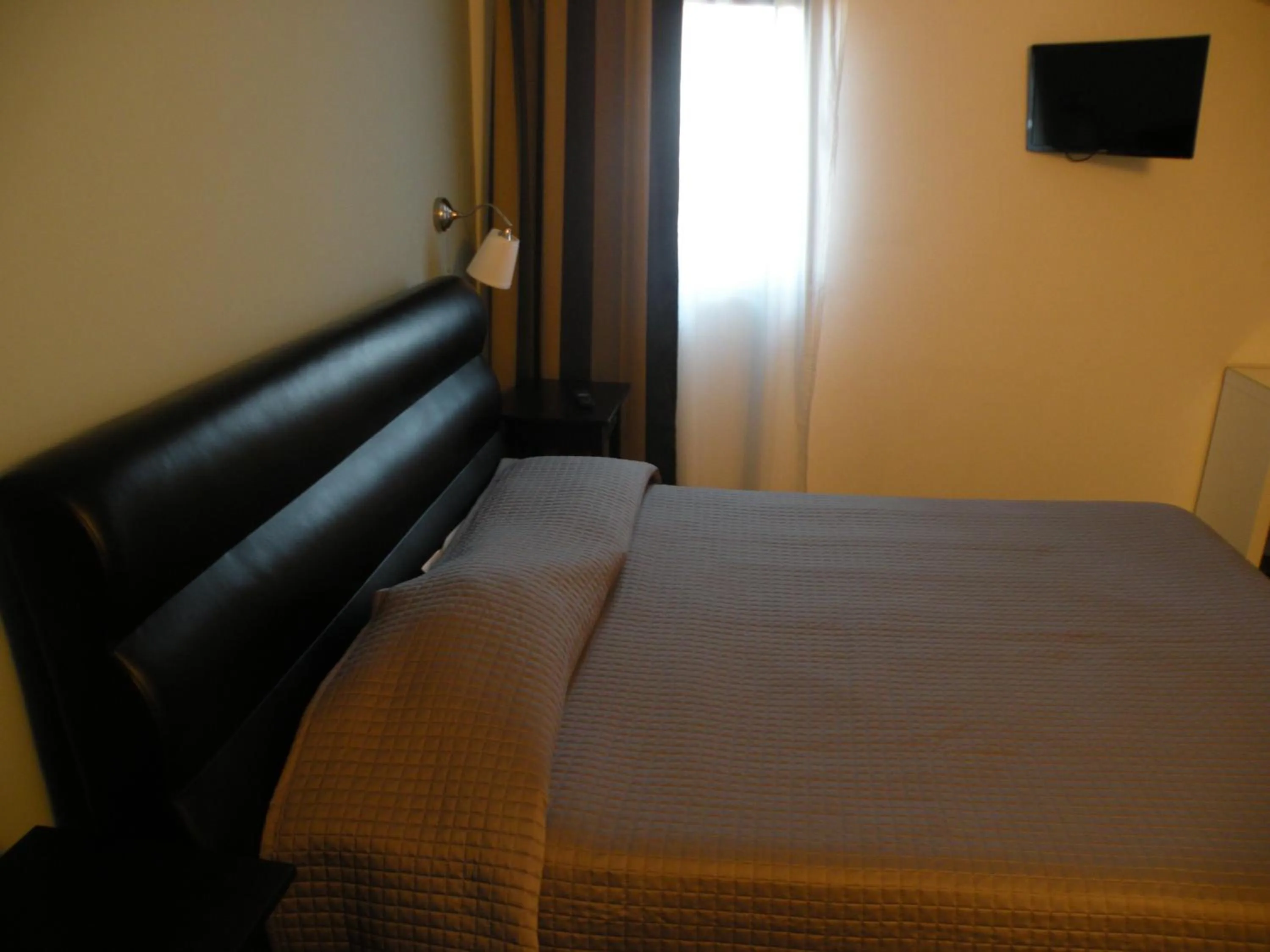 Bed in Hotel La Cavalera