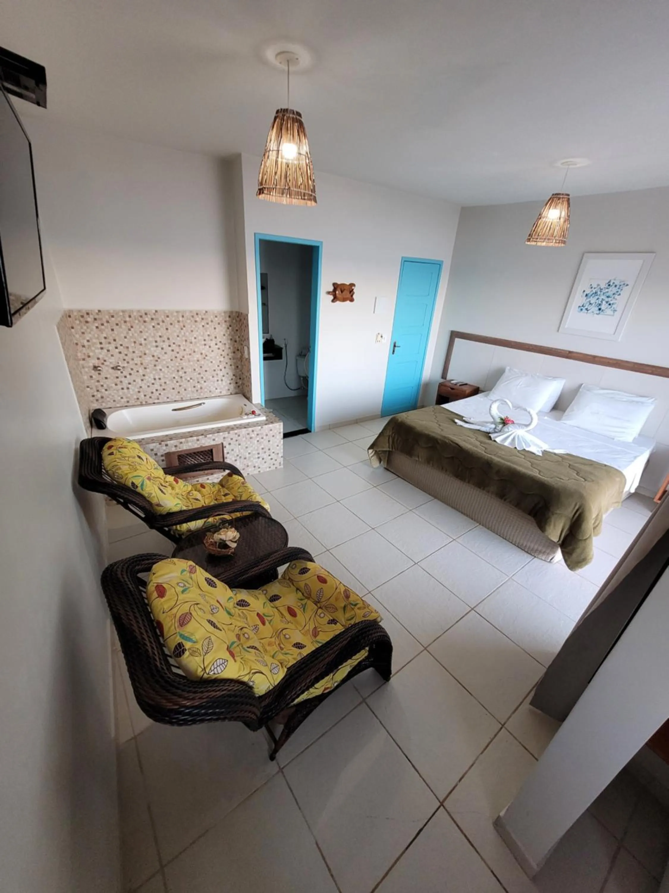 Photo of the whole room, Bed in Pousada Tartaruga