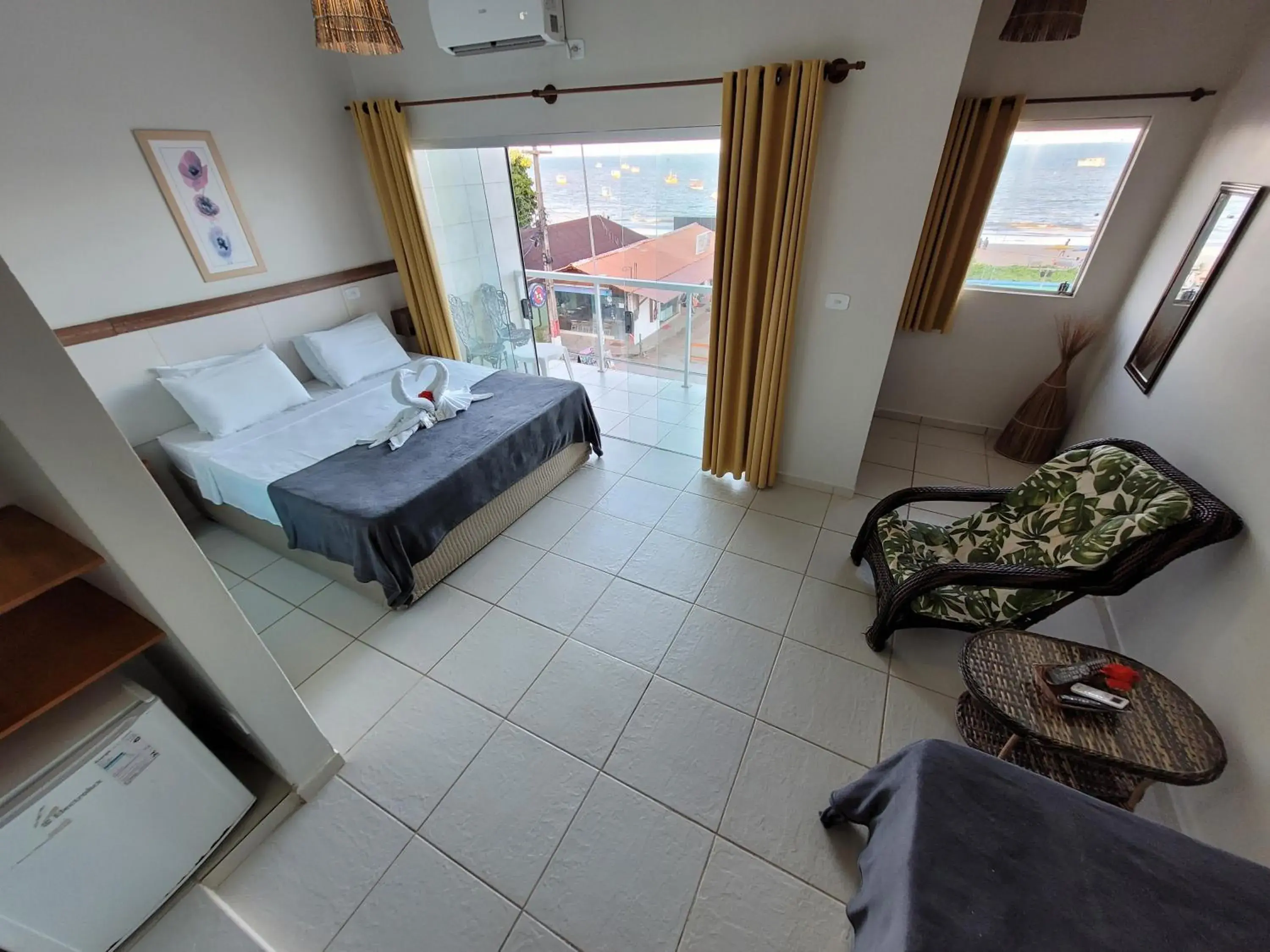 Standard Triple Room with Sea View in Pousada Tartaruga Standard Triple Room with Sea View in Pousada Tartaruga