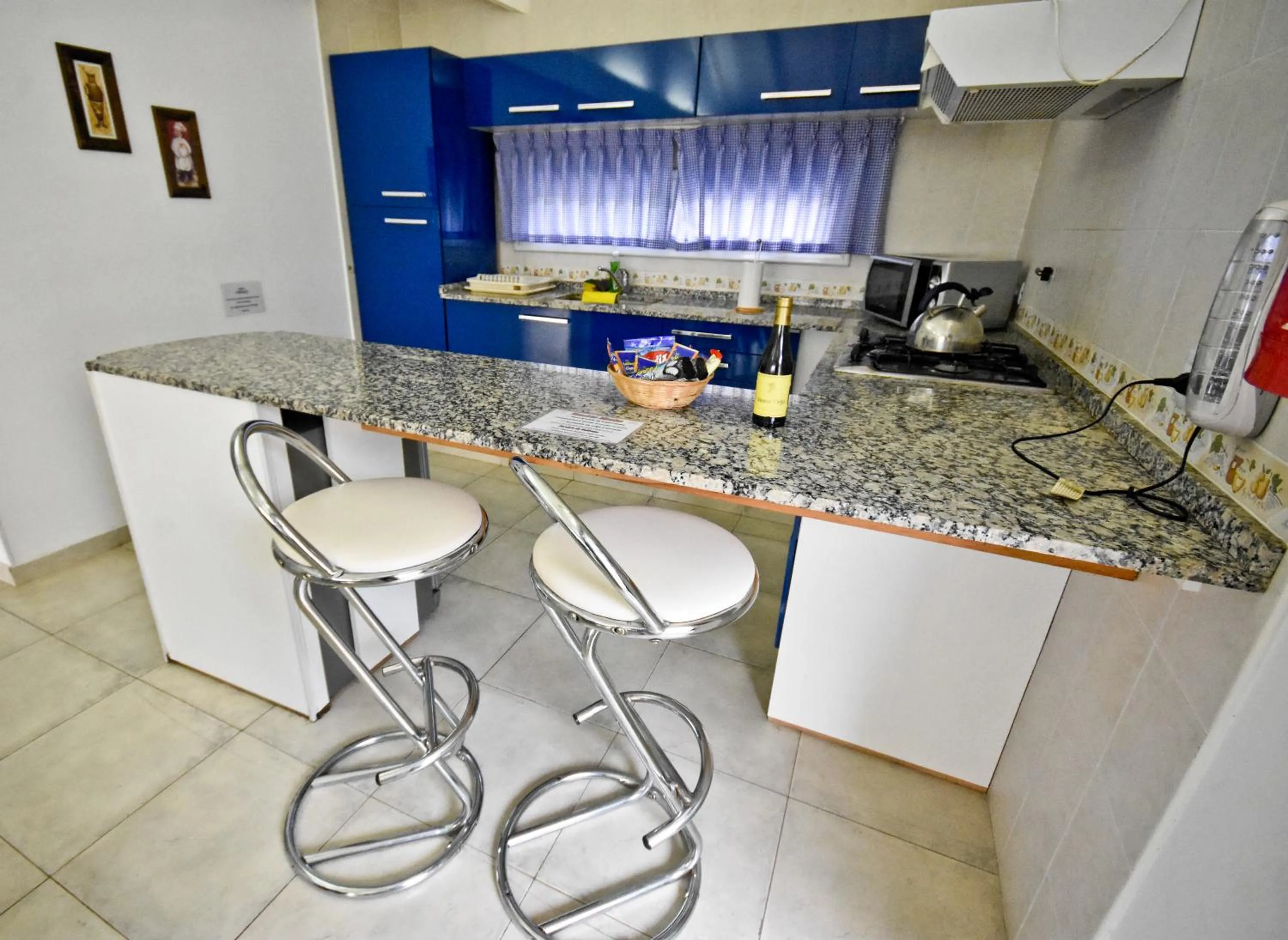 Kitchen or kitchenette in Villa La Font Apart Hotel & Spa