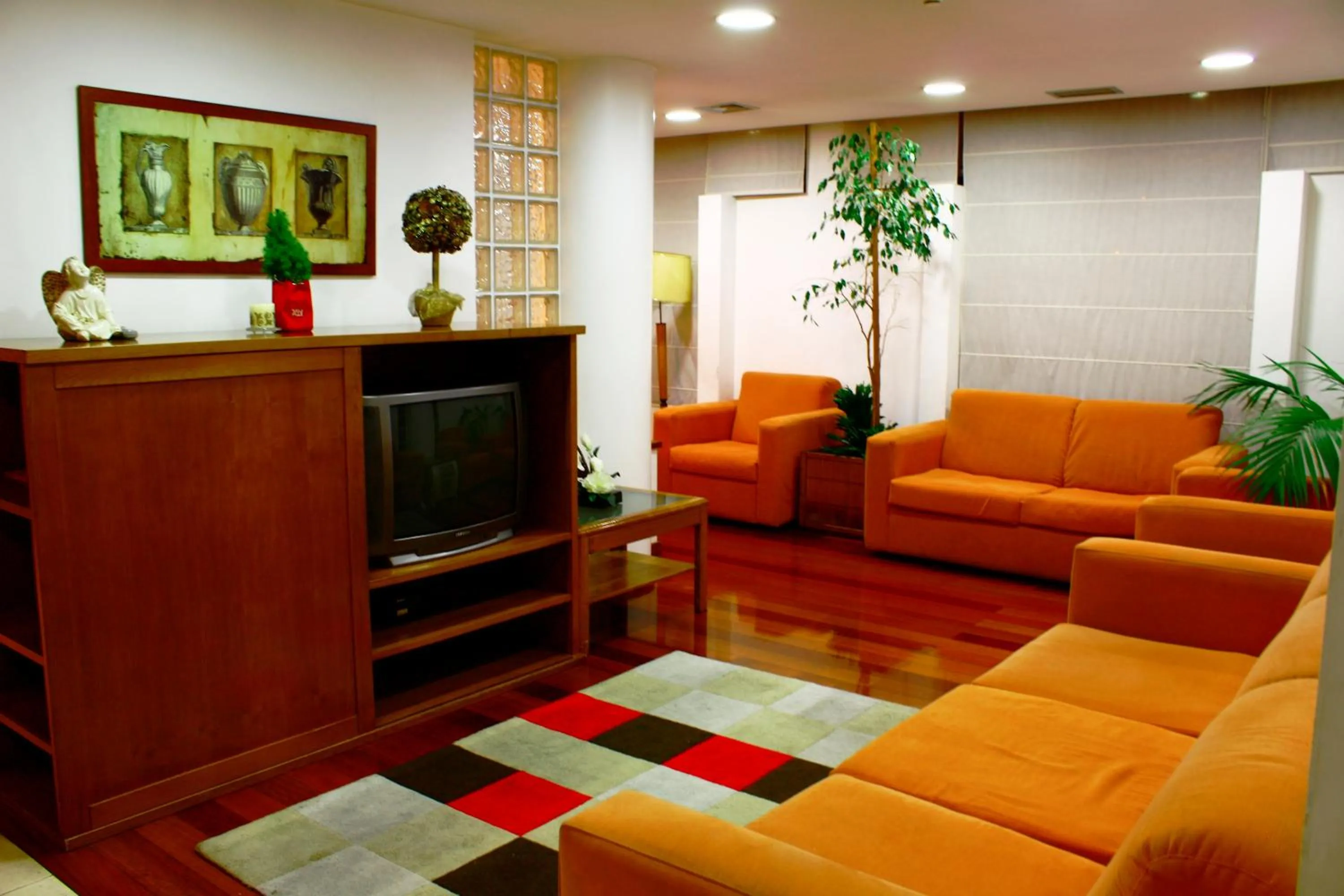 Communal lounge/ TV room in Hotel das Taipas