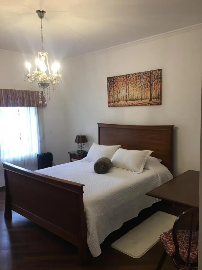 Bed in Center Suiço Flats