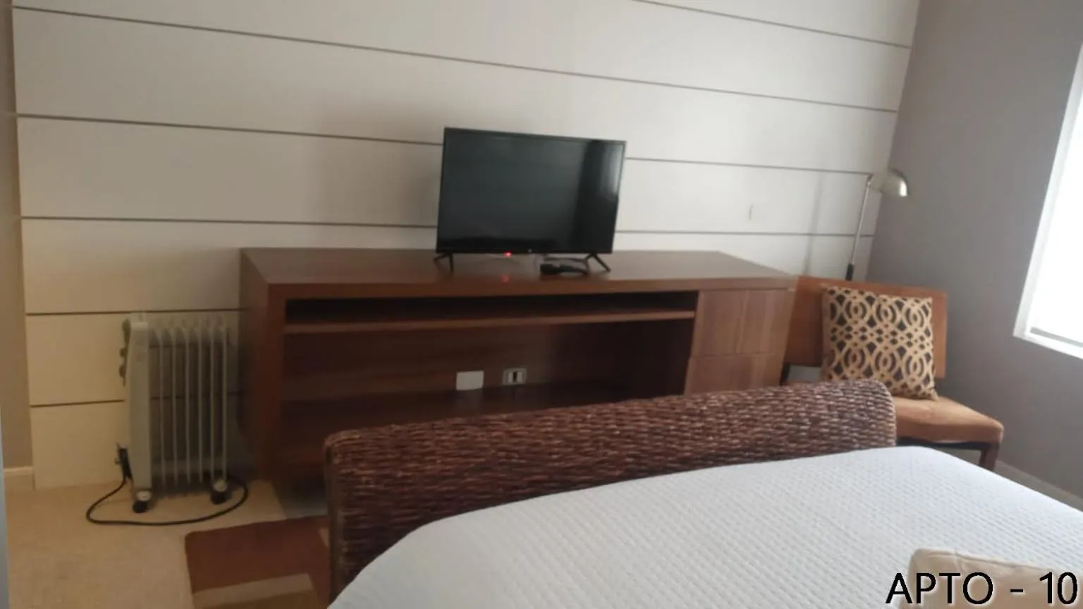 Bed in Center Suiço Flats