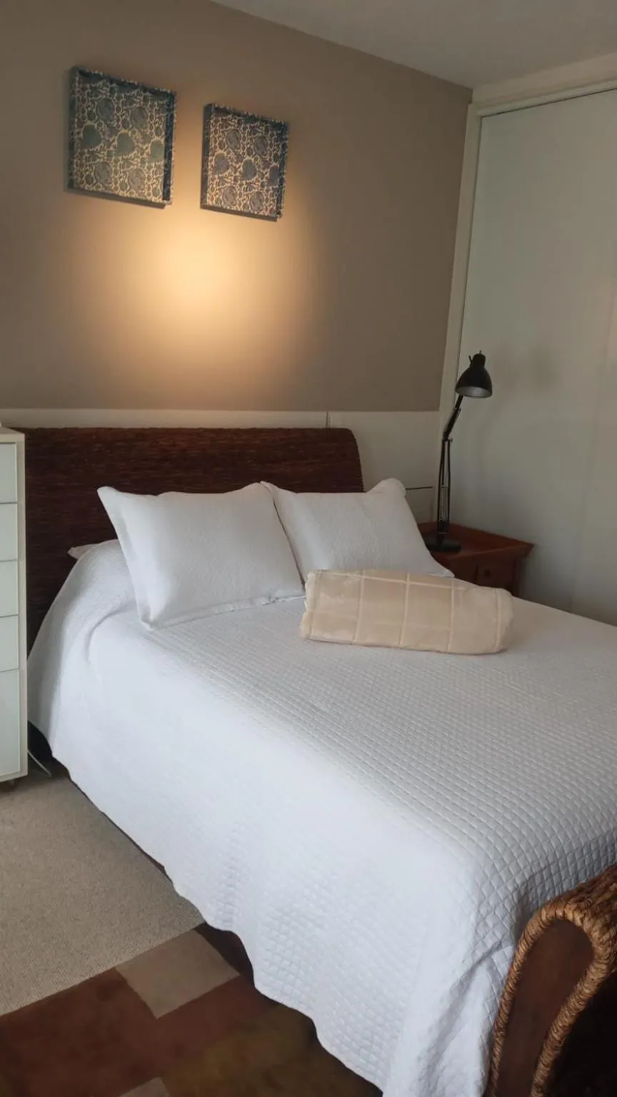 Bed in Center Suiço Flats