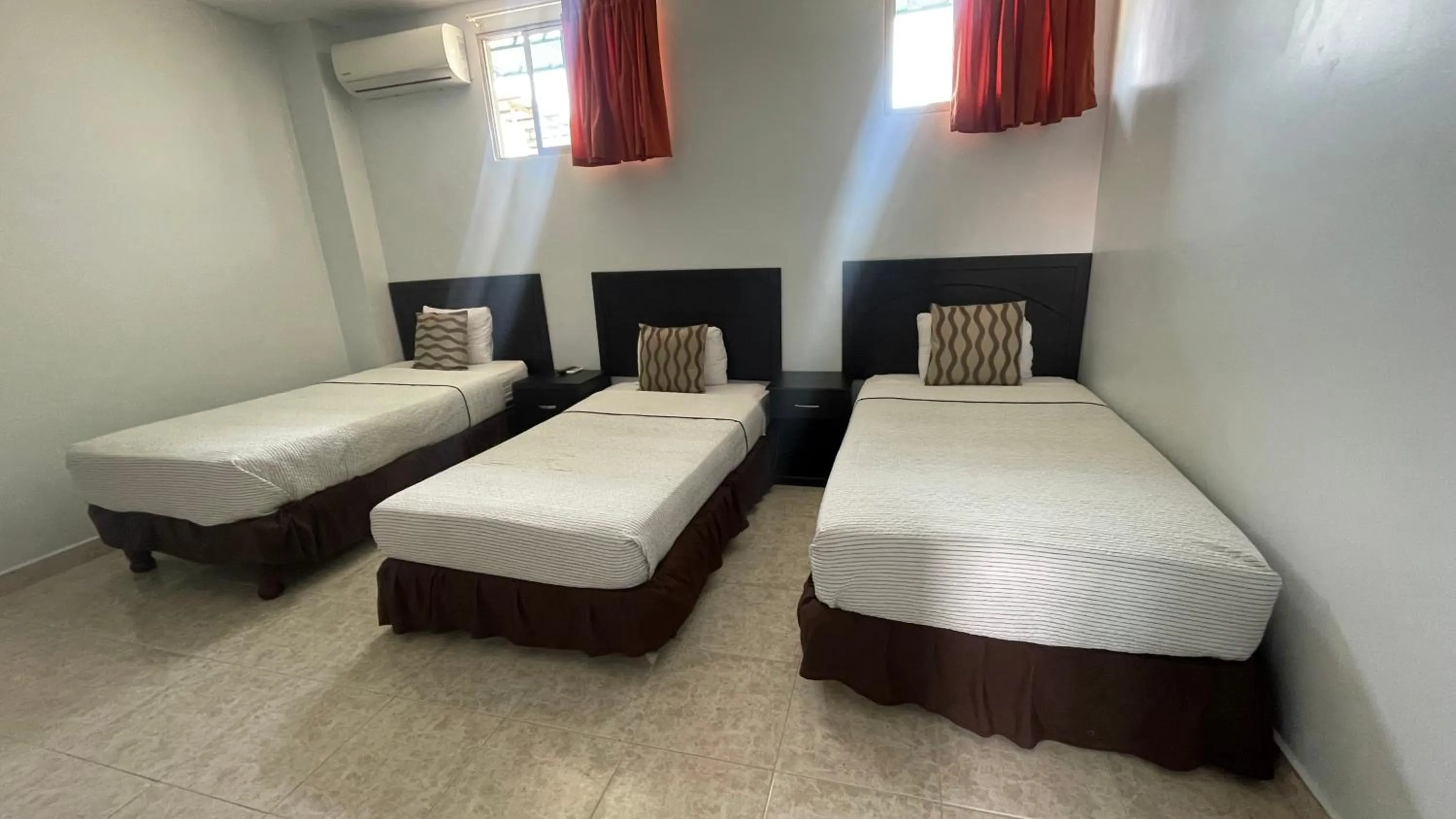 Bed in Hotel Air Suites