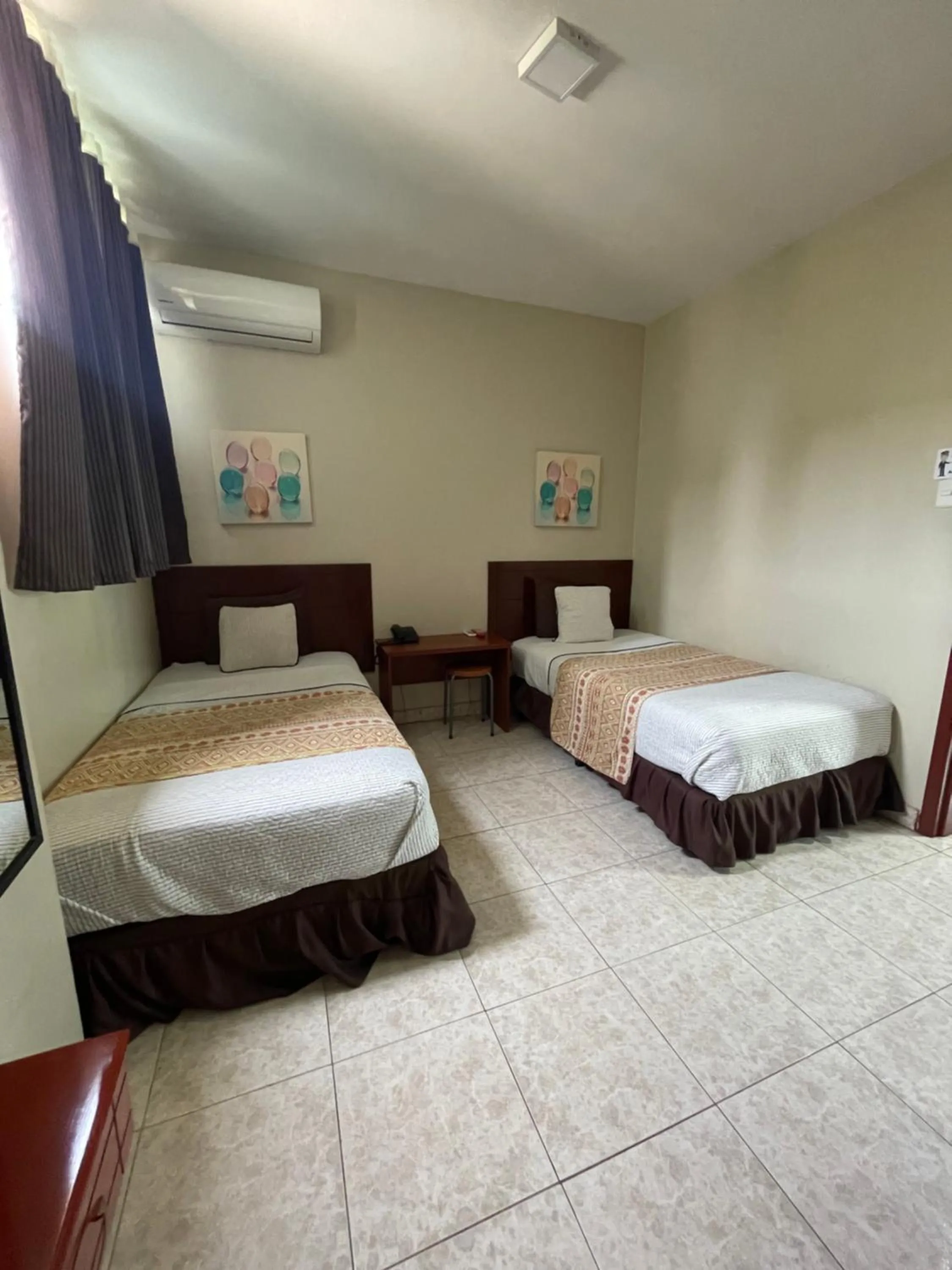 Bed in Hotel Air Suites