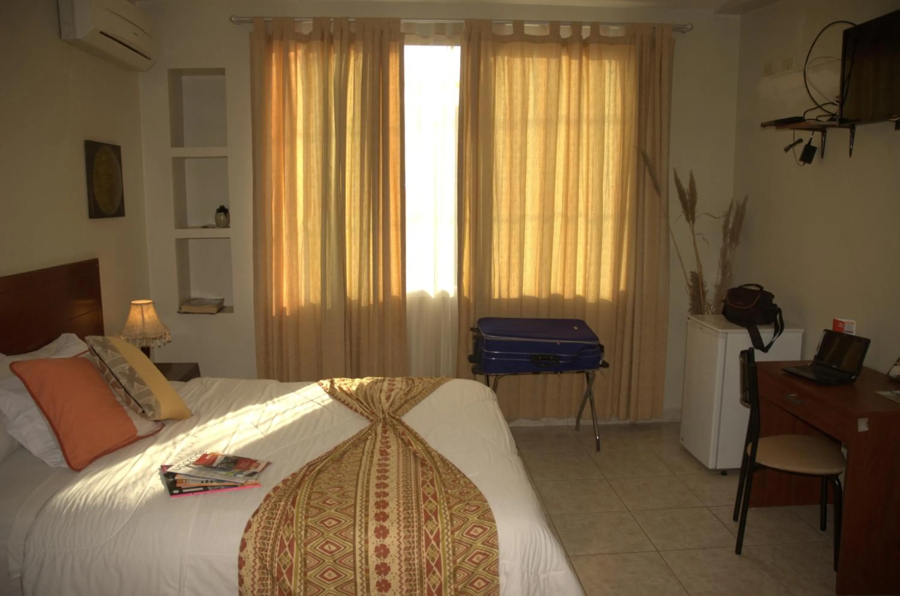 Bed in Hotel Air Suites