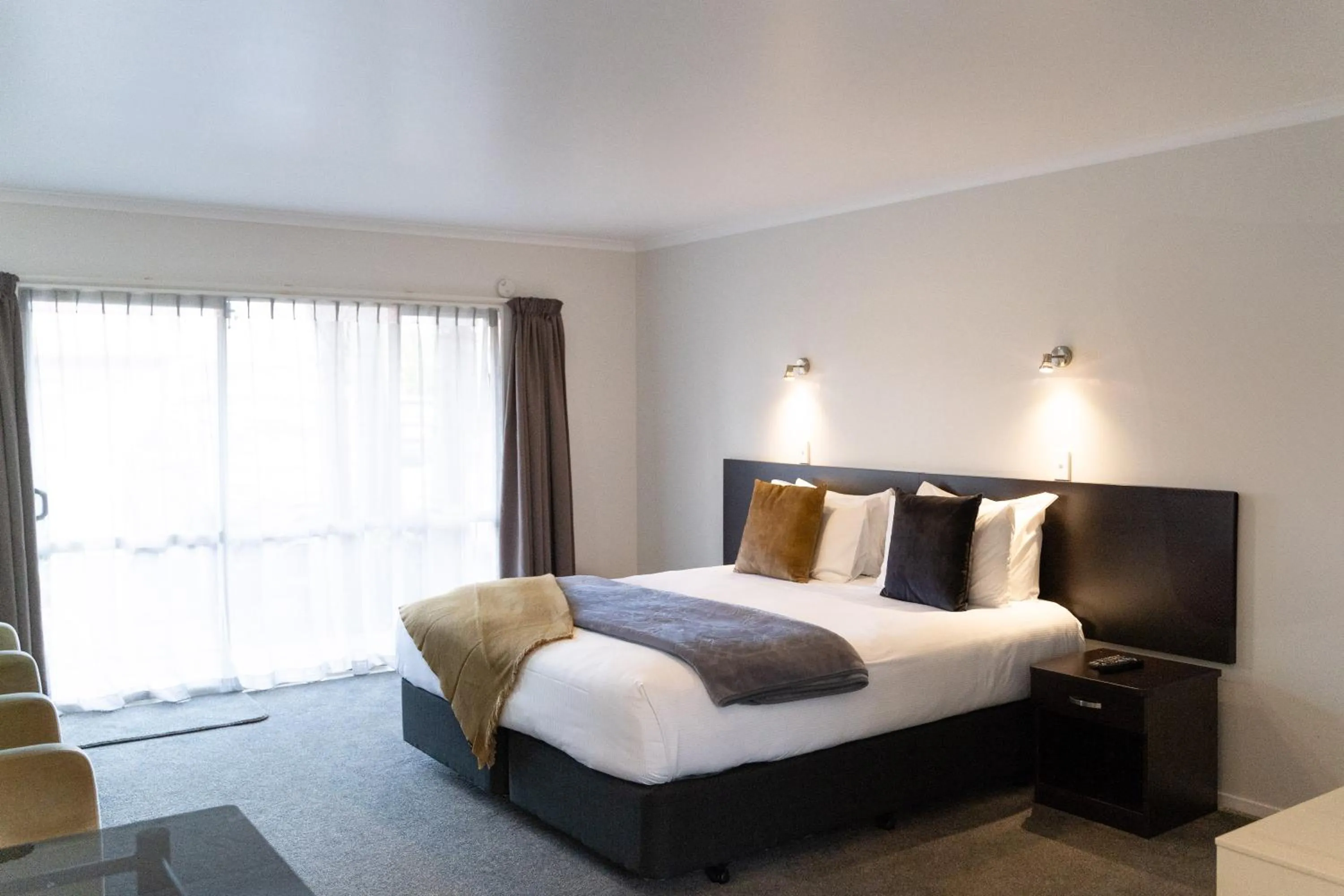 Bed in Pacific Coast Motor Lodge