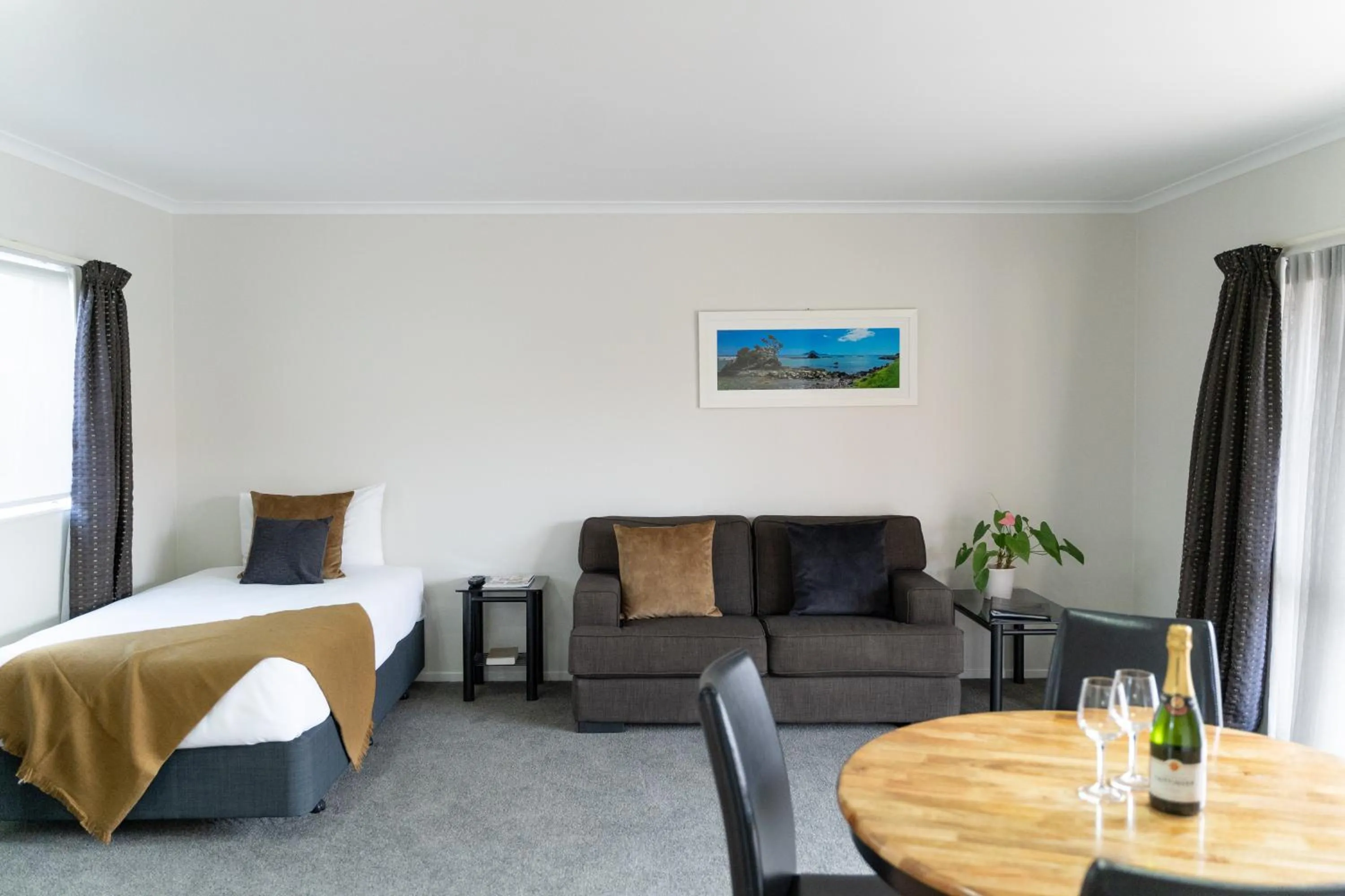 Bed in Pacific Coast Motor Lodge